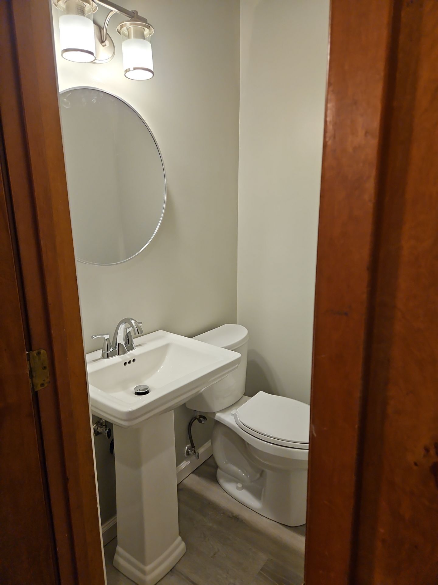 Bathroom Remodel using Luxury Vinyl Plank by The Shower Company
