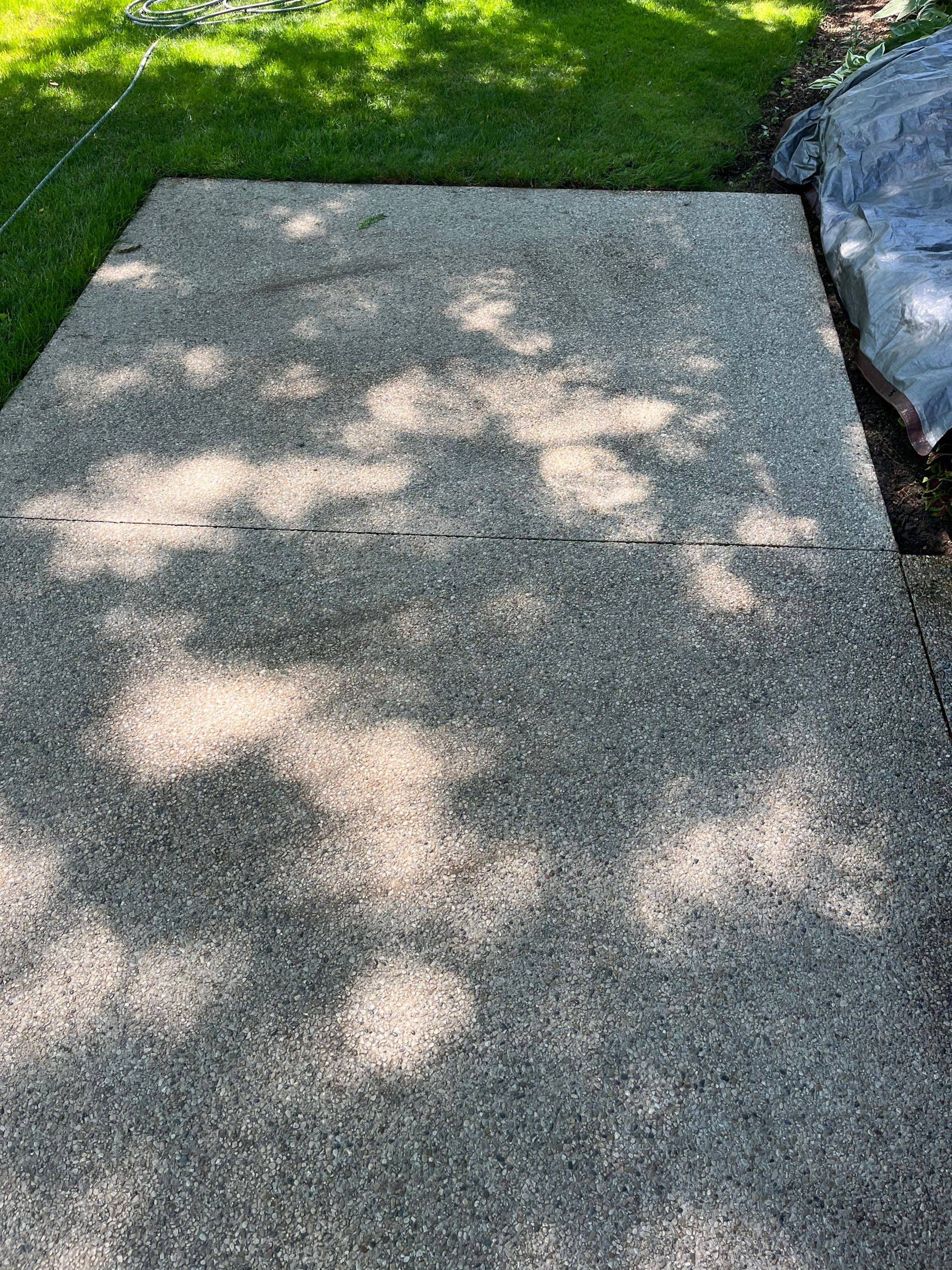 Aggregate concrete cleaning and sealing using Surebond SB-9000 by Northern Power Washing LLC.