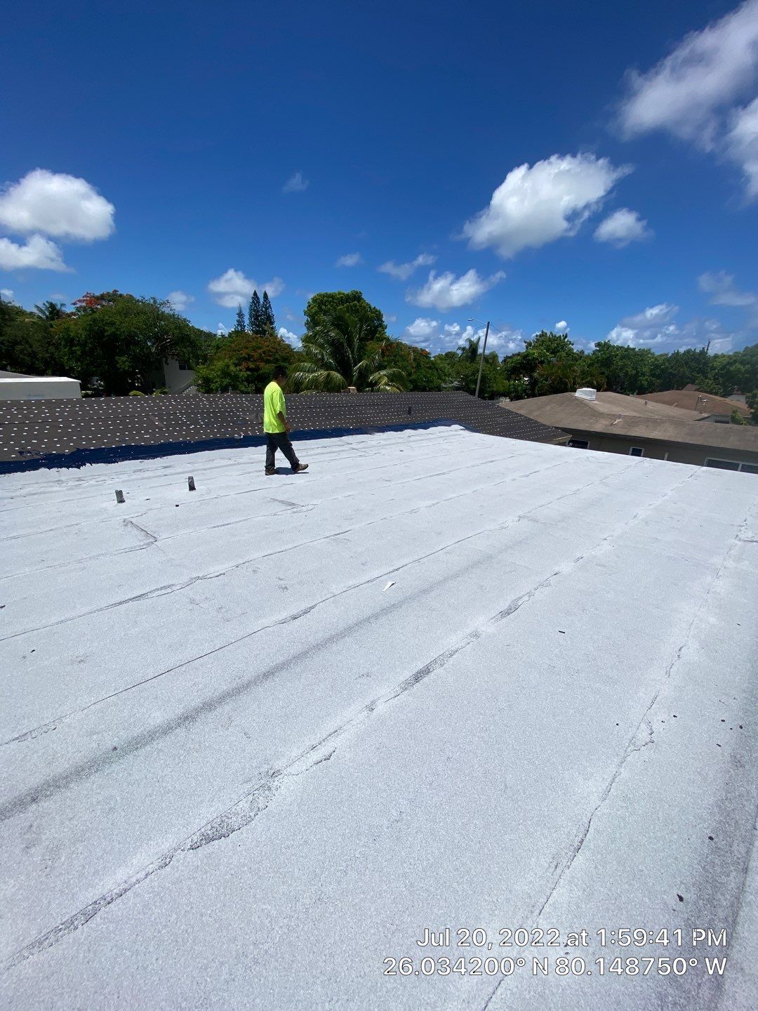 Standing Seam Metal & Flat Re-Roof using 1.5" Nail Strip 24ga Black Matte Kynar Coated Standing Seam Metal Panels by Morton Roofing, Inc.