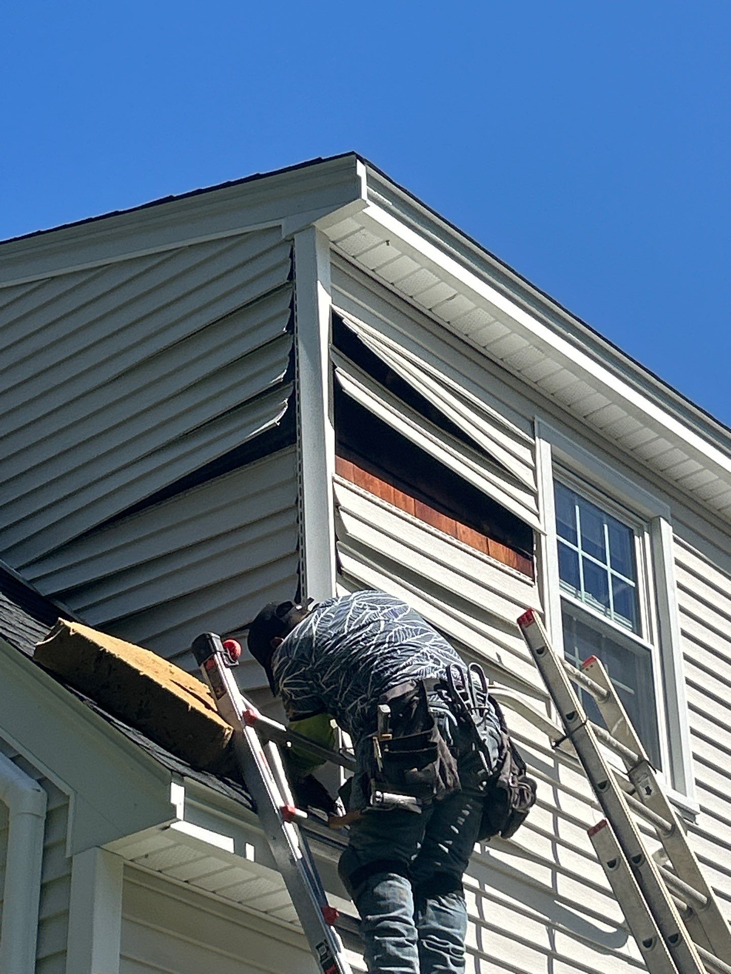 Vinyl Siding Repair with Spot Replacement by Mighty Dog Roofing of Greater Middlesex County