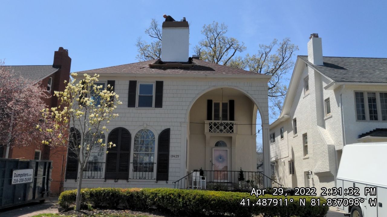 Residential Roofing Installation, Dec-tek walk-out porch roof, siding on garage by Absolute Roofing and Construction