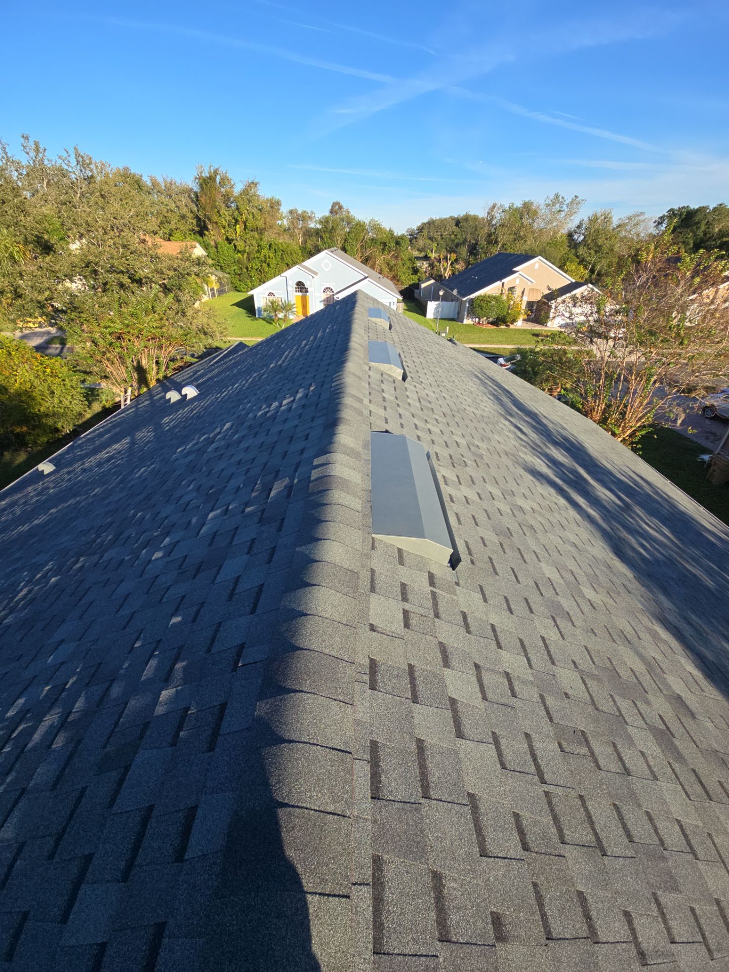 Atlas Pinnacle Pristine Architectural Shingle Roof Replacement in Kissimmee by Fortified Roofing Solutions Corp.