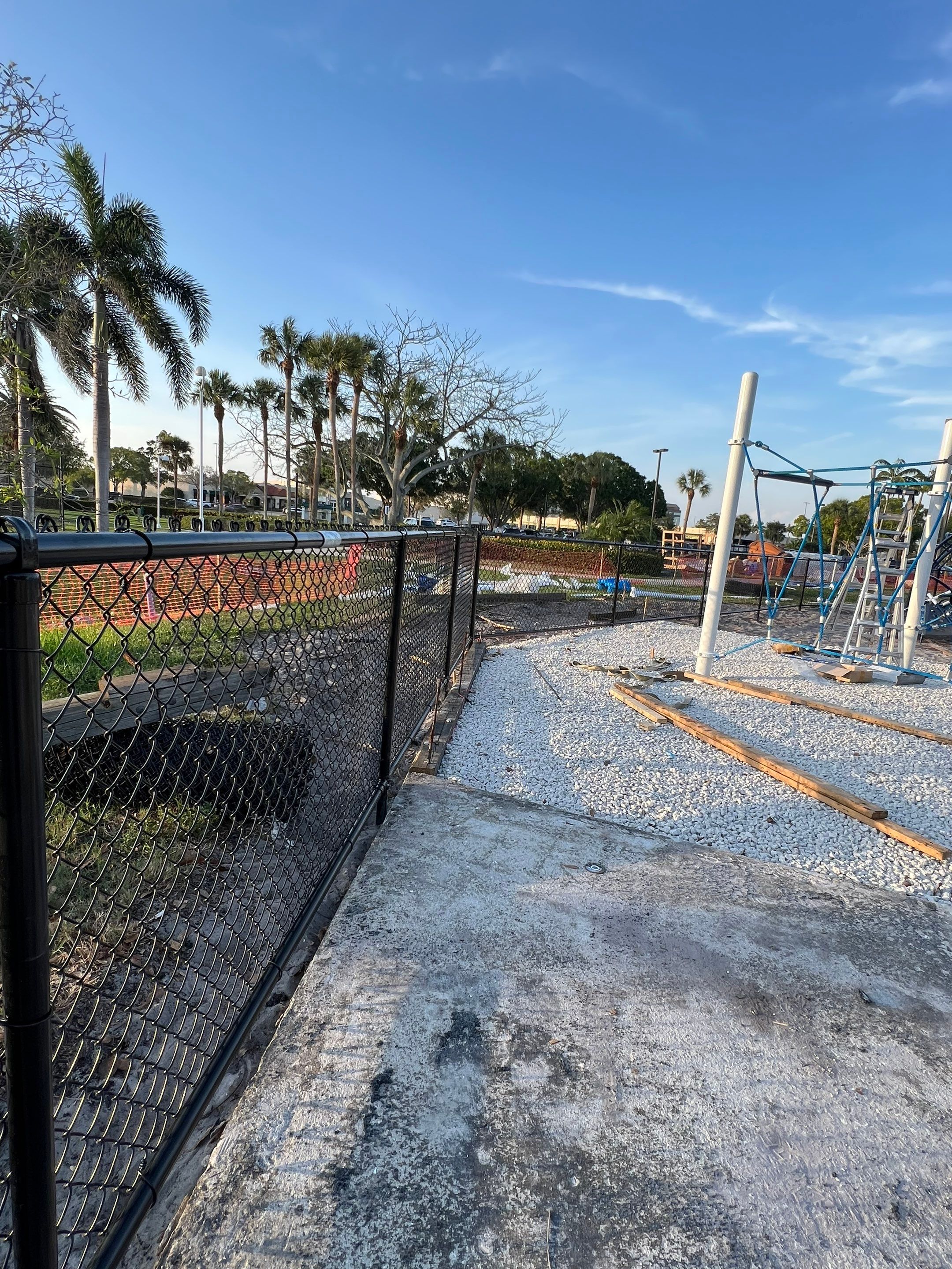 Vinyl Coated Chain-link fence for the City of Naples around Fleischmann Park Playground.  by Asap fence and gates, LLC