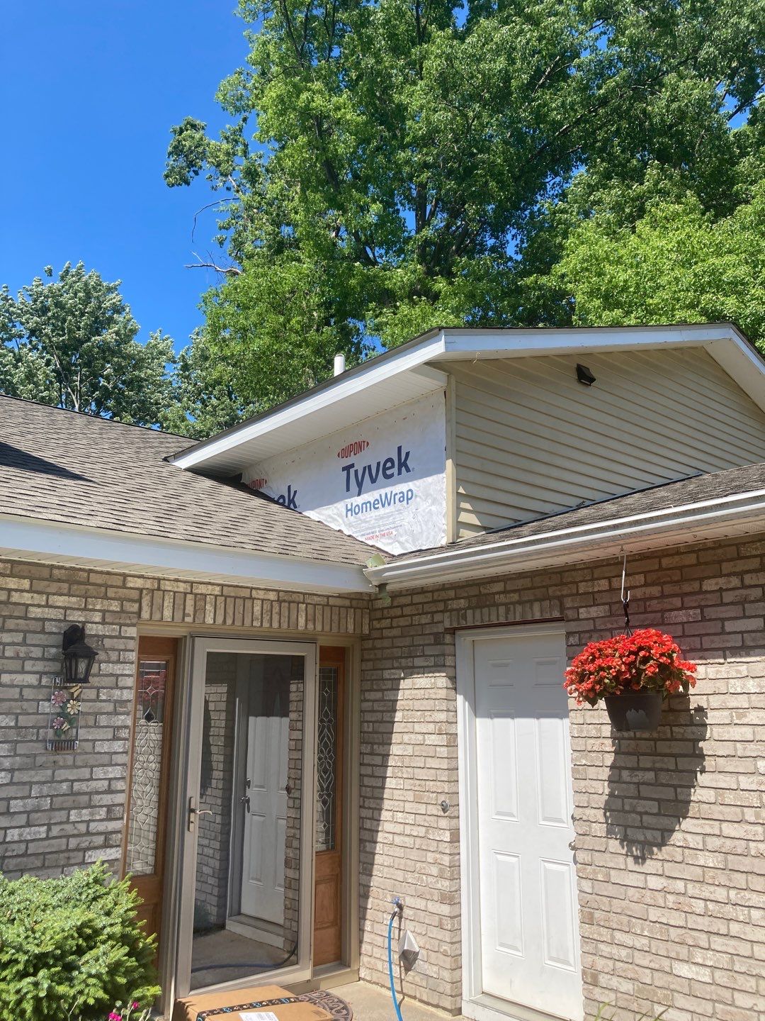 Gutter Installation using 5" Seamless Aluminum Gutters by Absolute Roofing and Construction