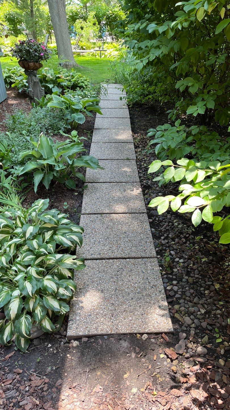 Aggregate concrete cleaning and sealing using Surebond SB-9000 by Northern Power Washing LLC.