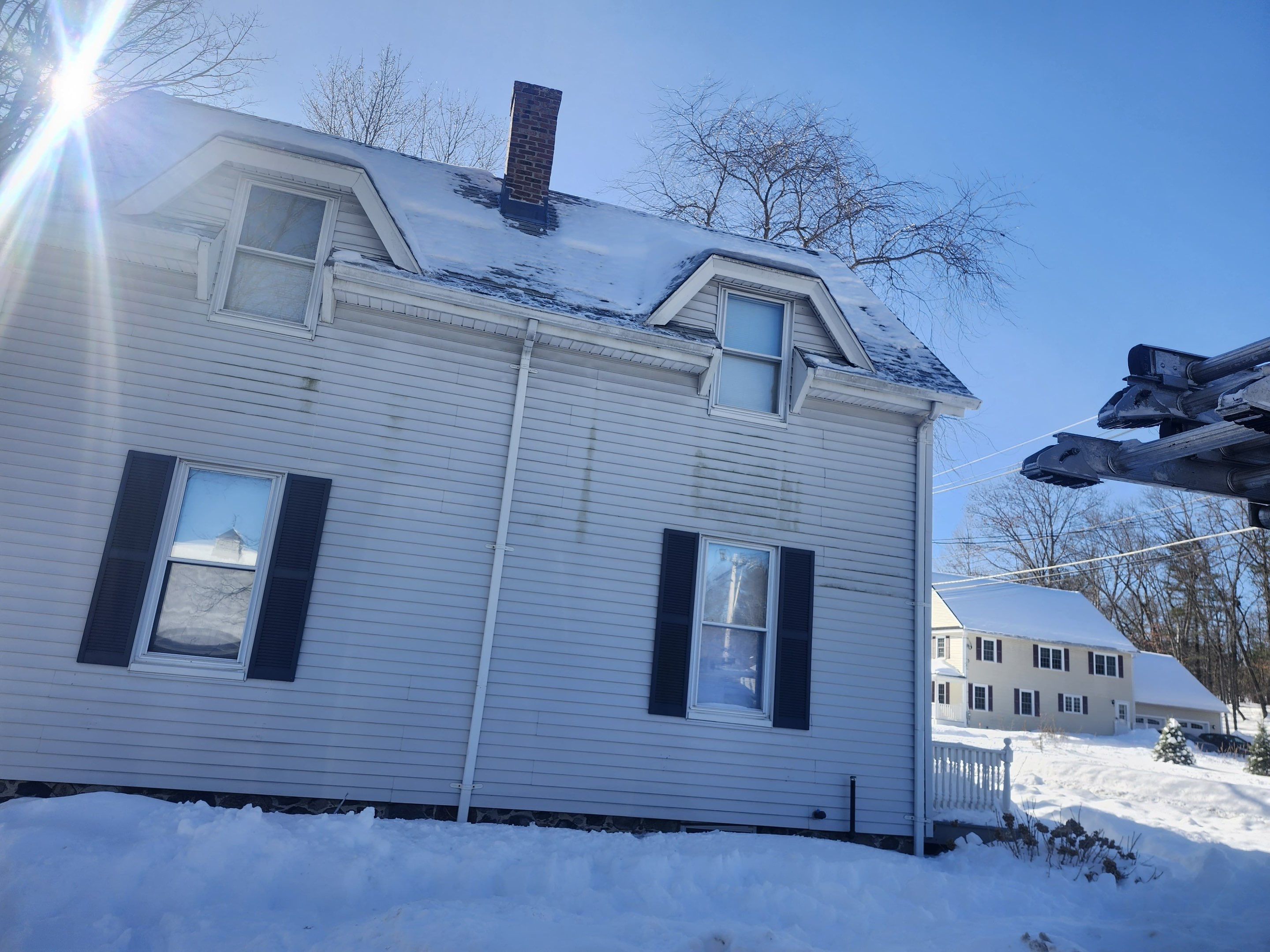 Ice Dam and snow removal by Mighty Dog Roofing of Greater Middlesex County