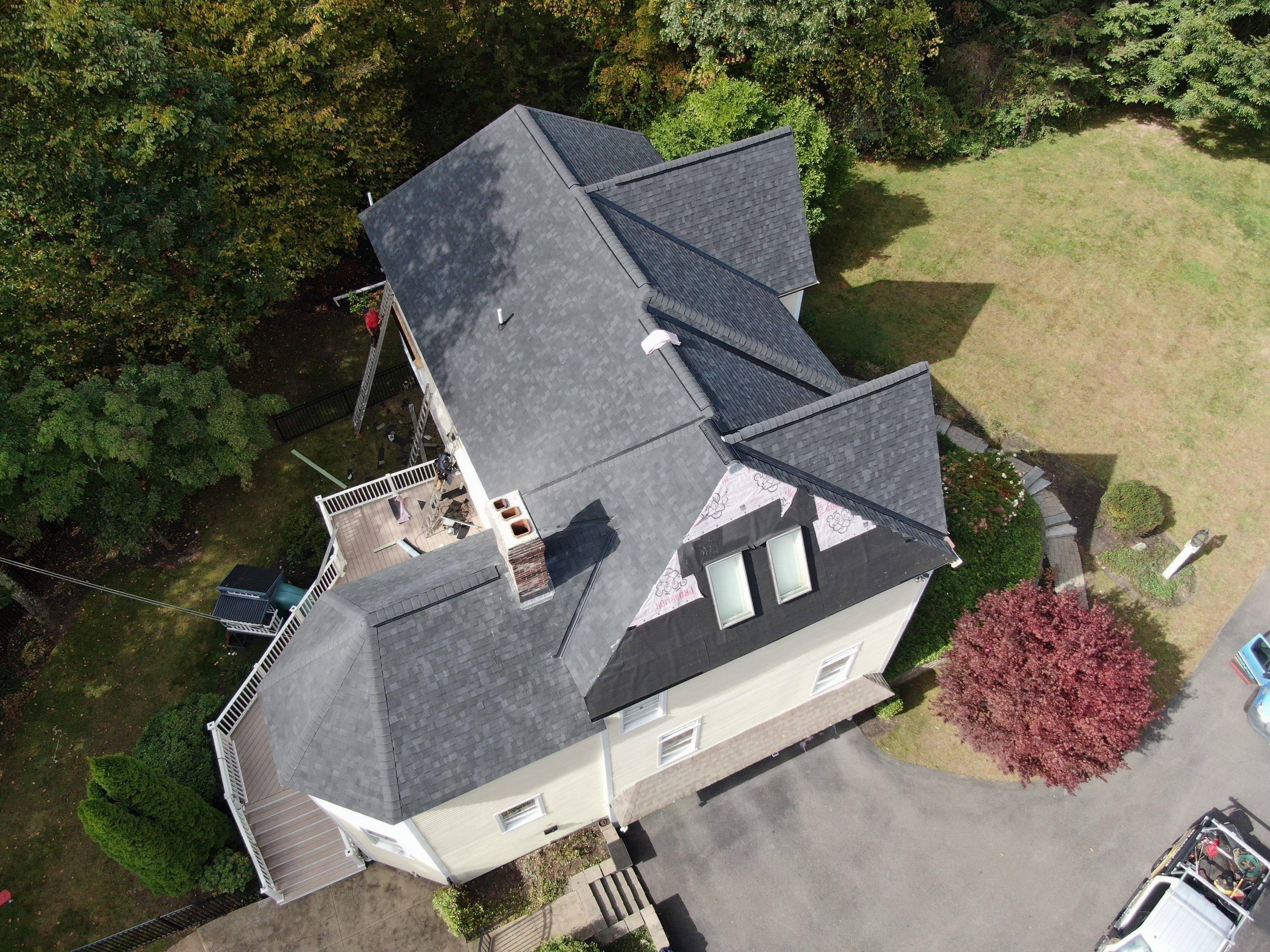 New Roof, Skylights, and Metal Accent Roof Installation in Groton by Mighty Dog Roofing of Greater Middlesex County