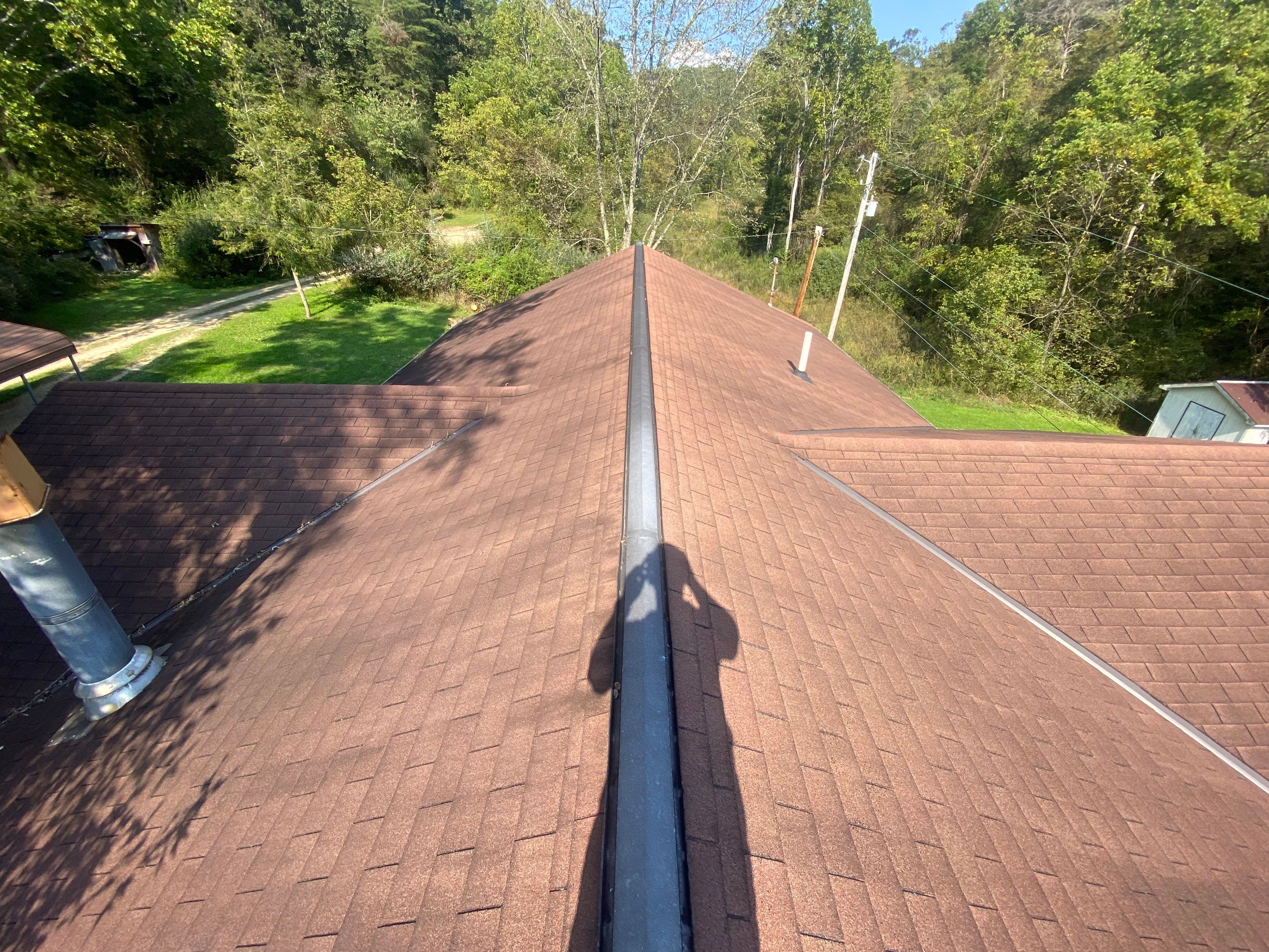 Metal Roof and Vinyl Siding, Soffit, Gutters using LifeTite Premium metal roofing  by Secure Construction Company Inc