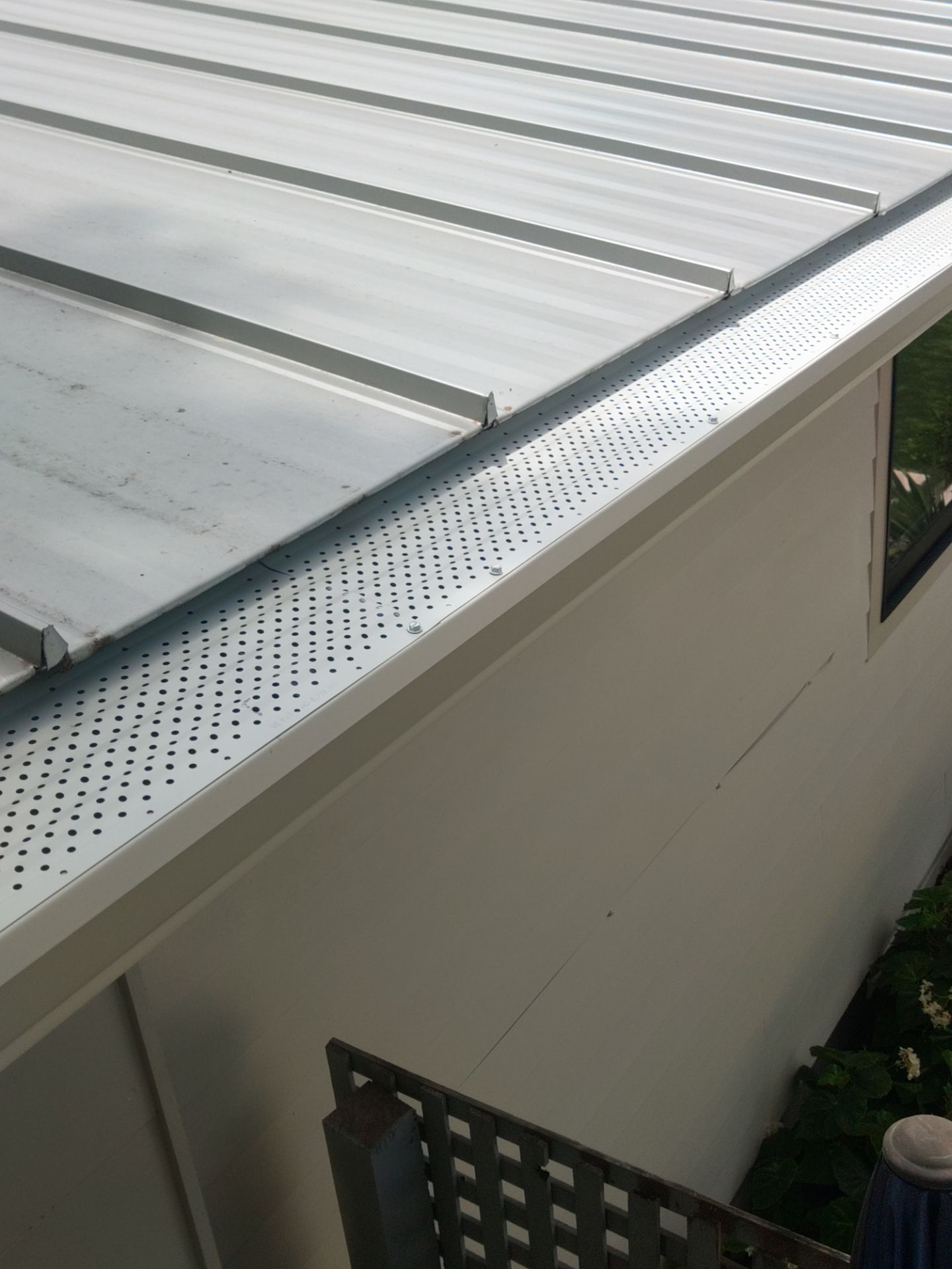 Aluminum Seamless Gutters using 3X4 Elbow Downspout in Sarasota FL by Gutter Professors