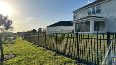 Aluminum Fence Installation using Black 3 Rail Aluminum Fence