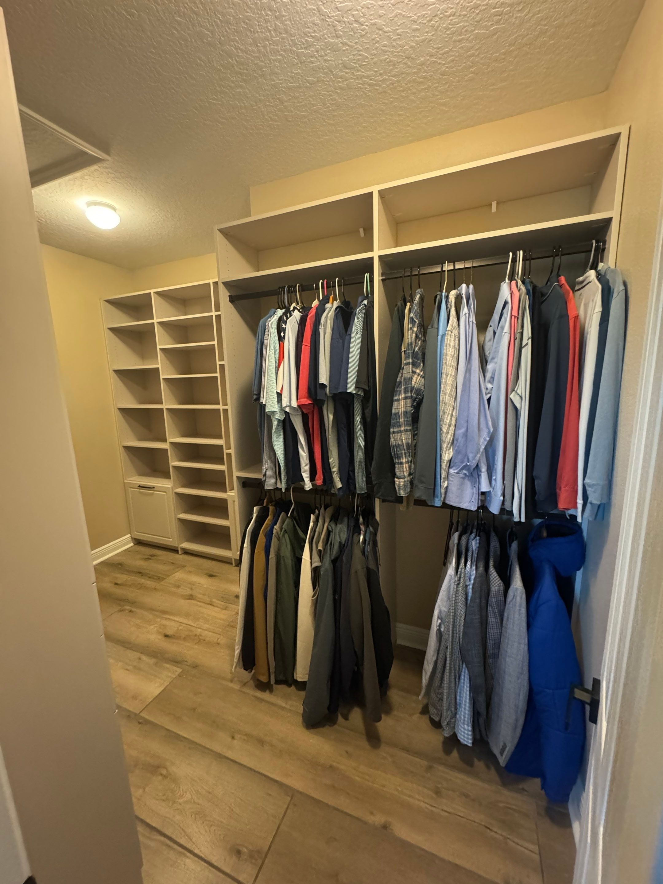 Custom Closet Storage Systems and Laminate Cabinetry Installation in Oldsmar by Square 1 Garage and Closet Solutions
