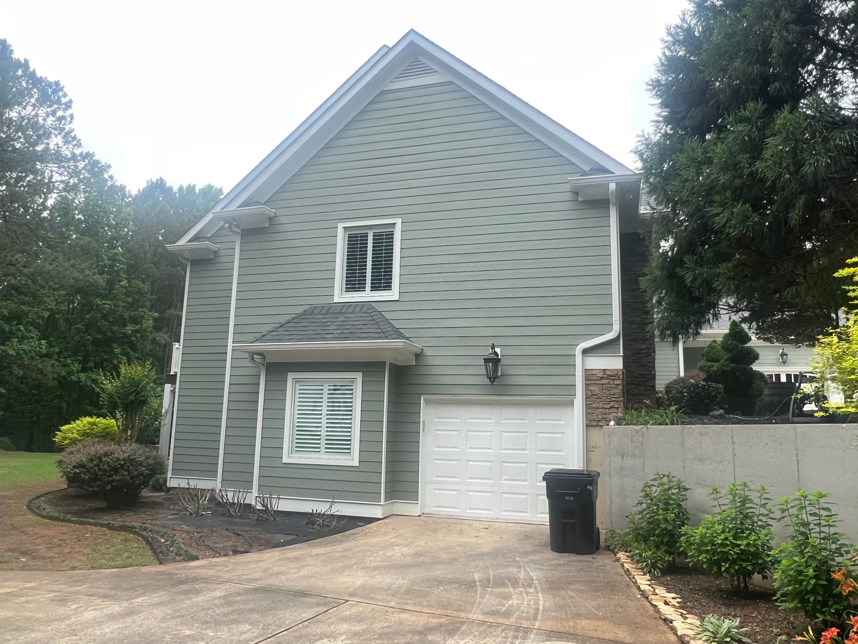 Sage Green Exterior House Painting and Trim Refresh in McDonough by Swift Home Renovations