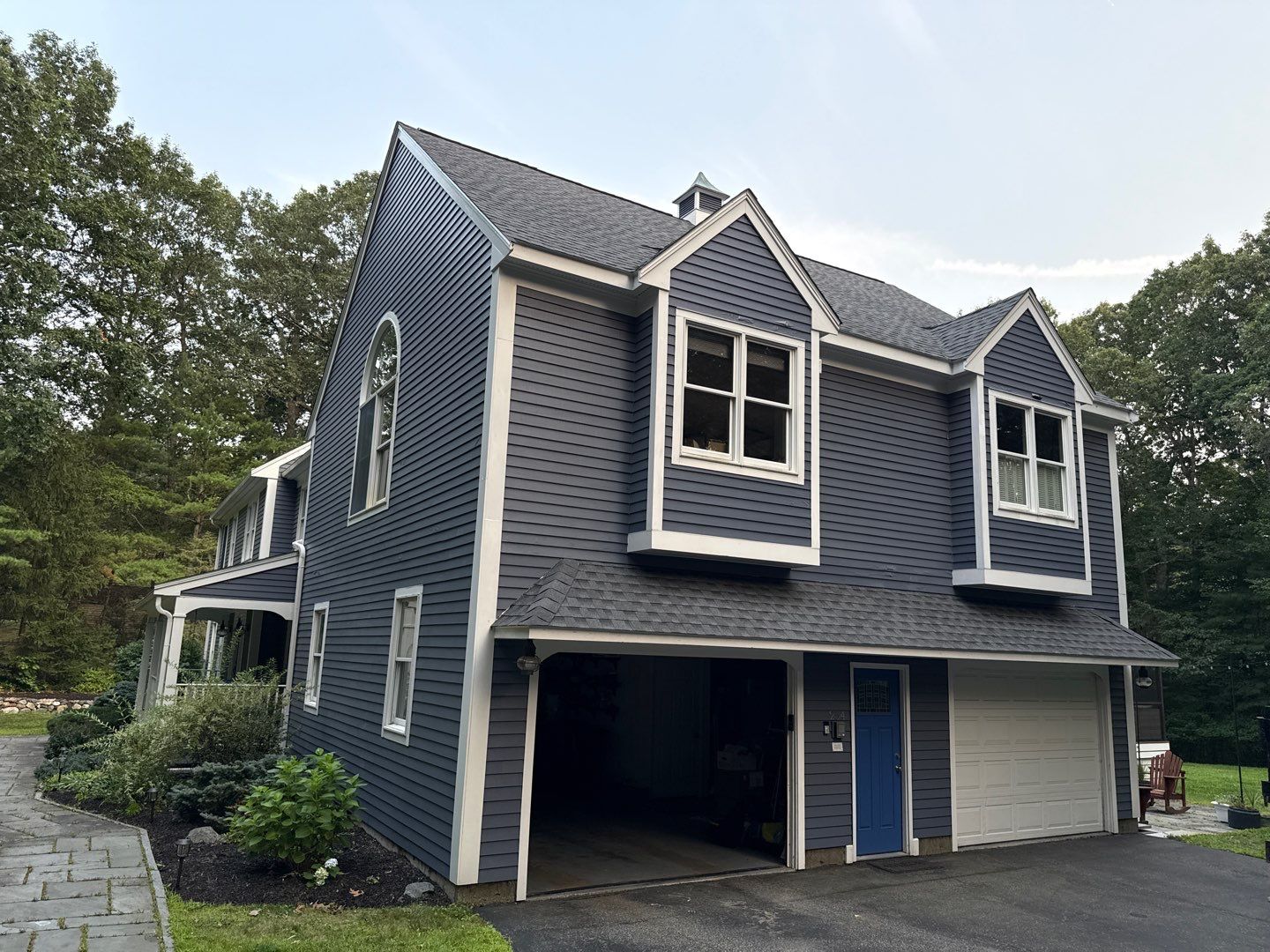 Solar-Ready Roof Replacement with GAF Pewter Gray Shingles & VELUX Skylights by Sensible Home Solutions