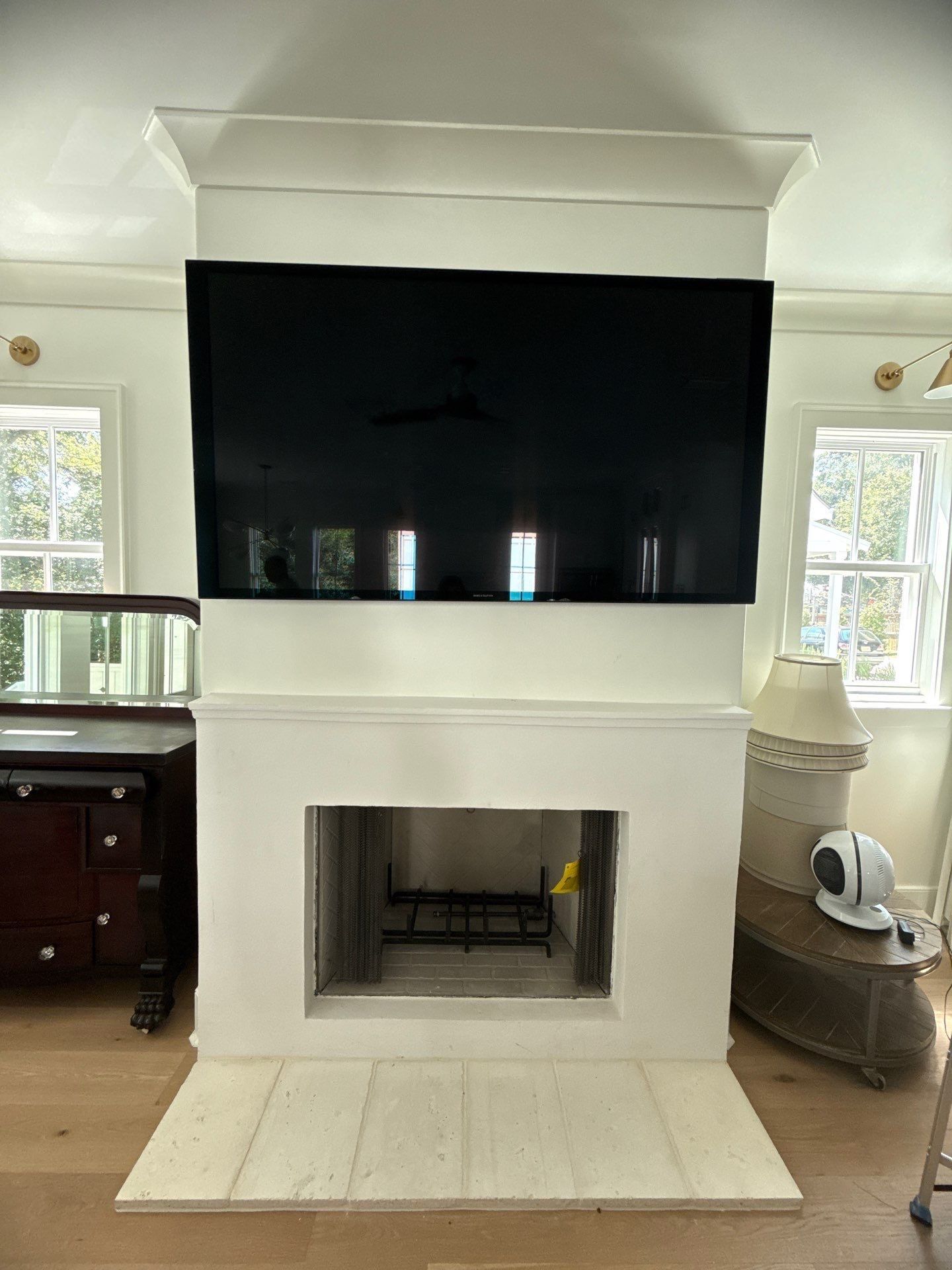 Fireplace TV Mounting Projects by Hangman Mounting & Installation 