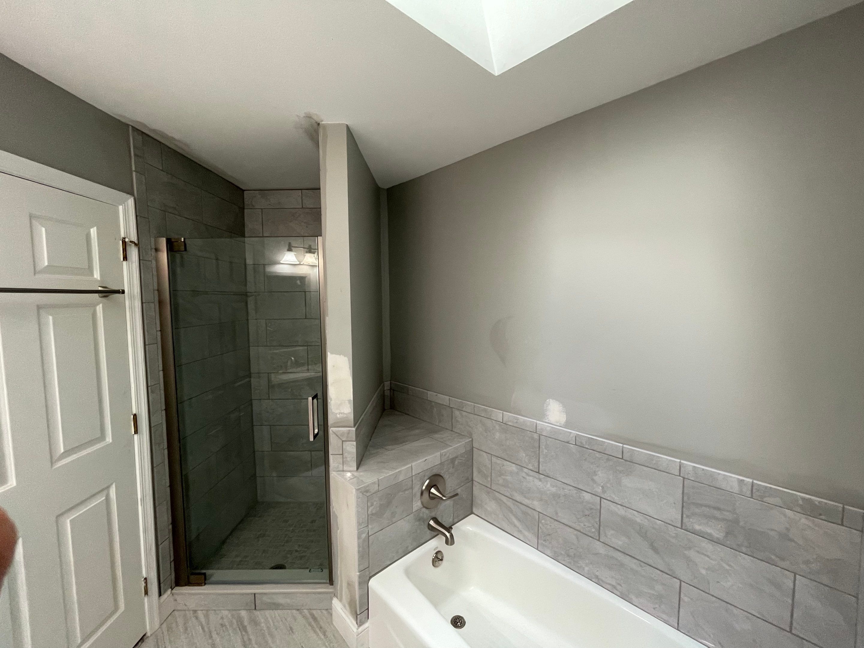 Bathroom Remodel using Tile by Home Concepts Construction
