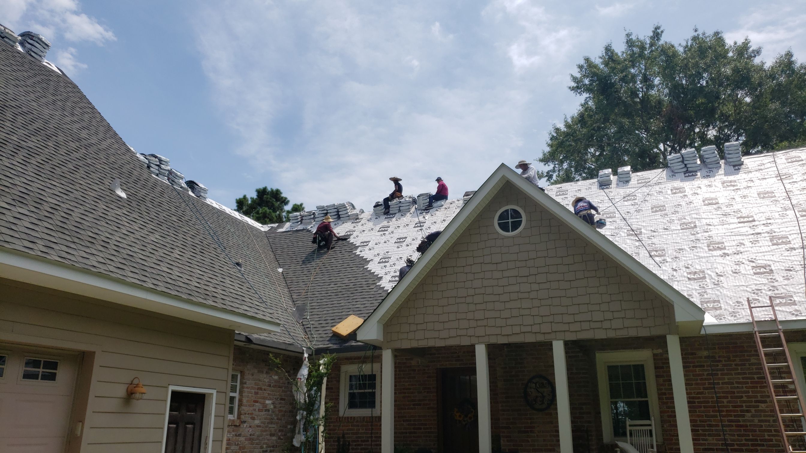 Residential Roofing Installation using Roof Replacement by American Roofing & Construction LLC