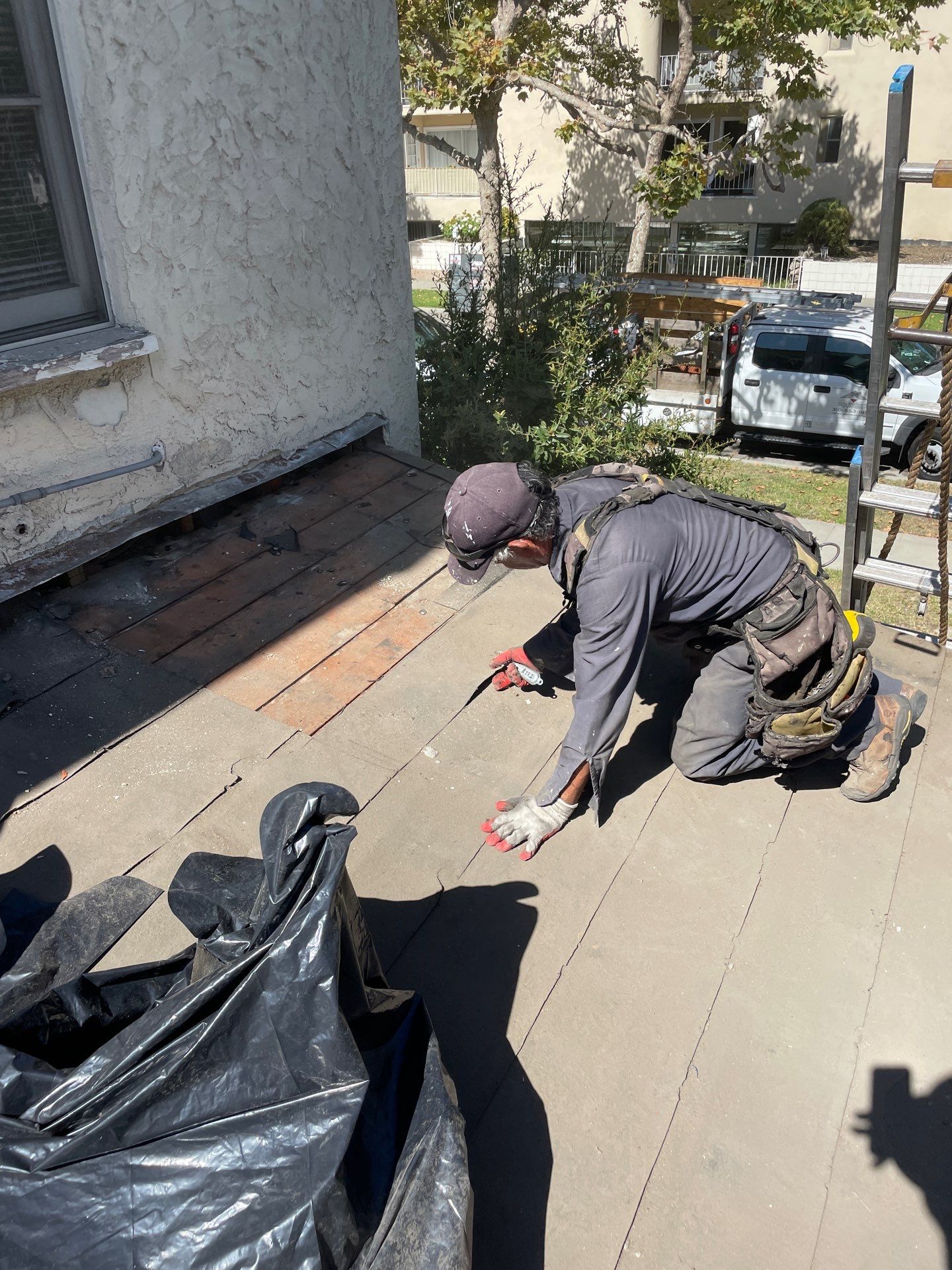 Beverly Hills Flat Roof Coating and Terracotta Tile Reset by Hull Brothers Roofing
