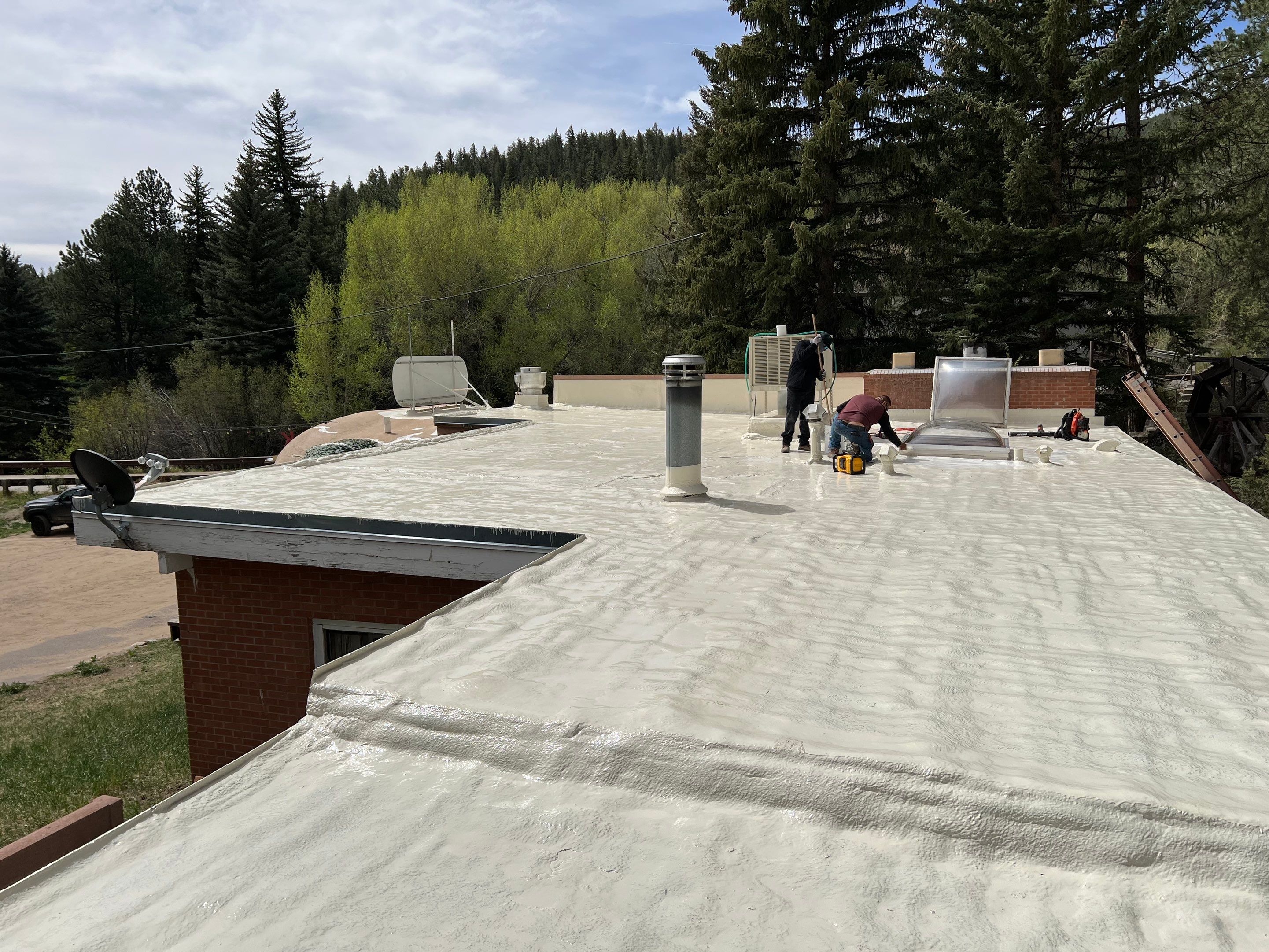 Commercial Roofing Installation using CASTAGRA ECODUR COATING by A to Z Roofing