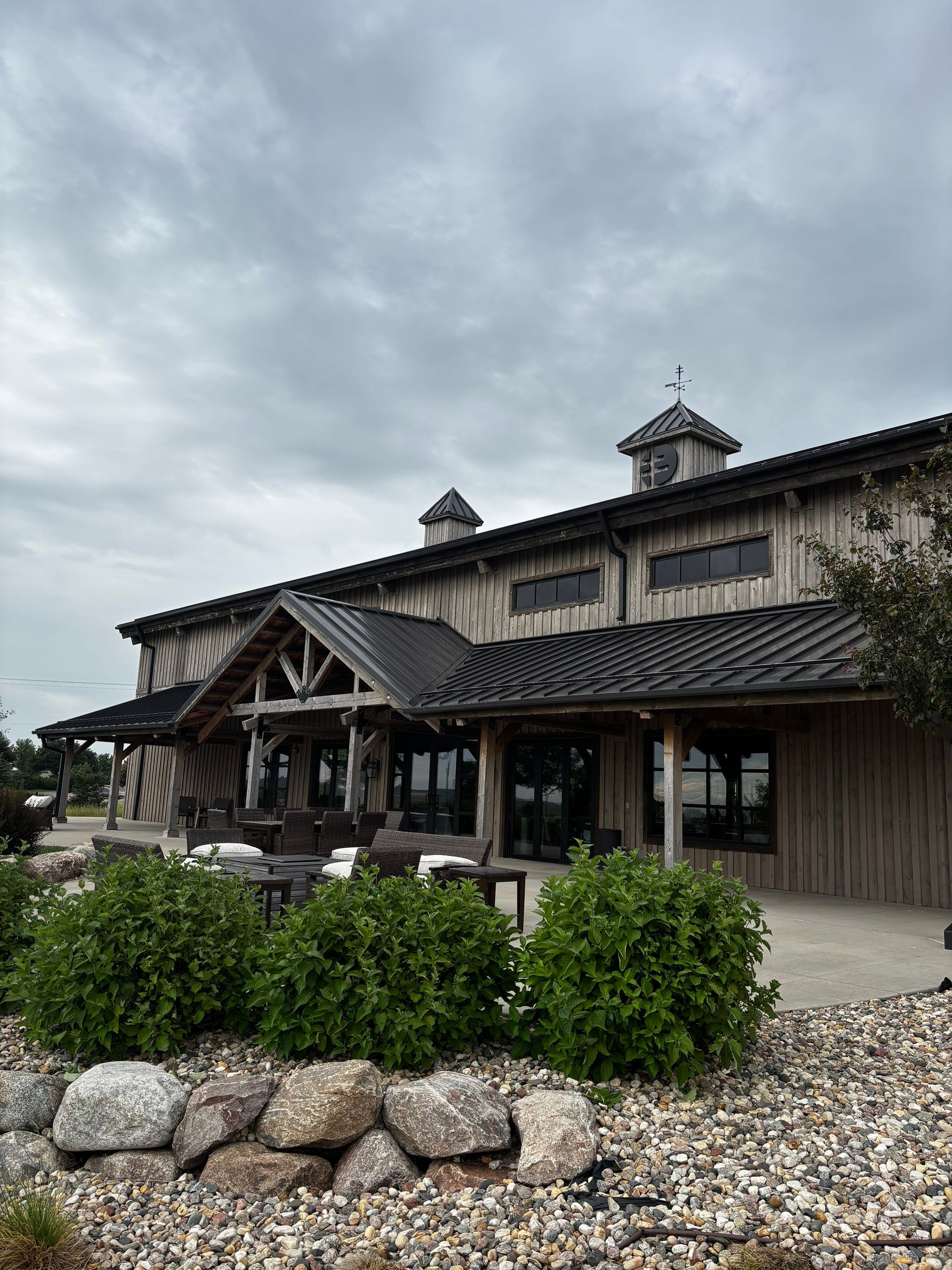 Commercial Exterior Wood Staining for Sanford Barn in Sioux Falls by Select Painting, Coatings & Garage Cabinets