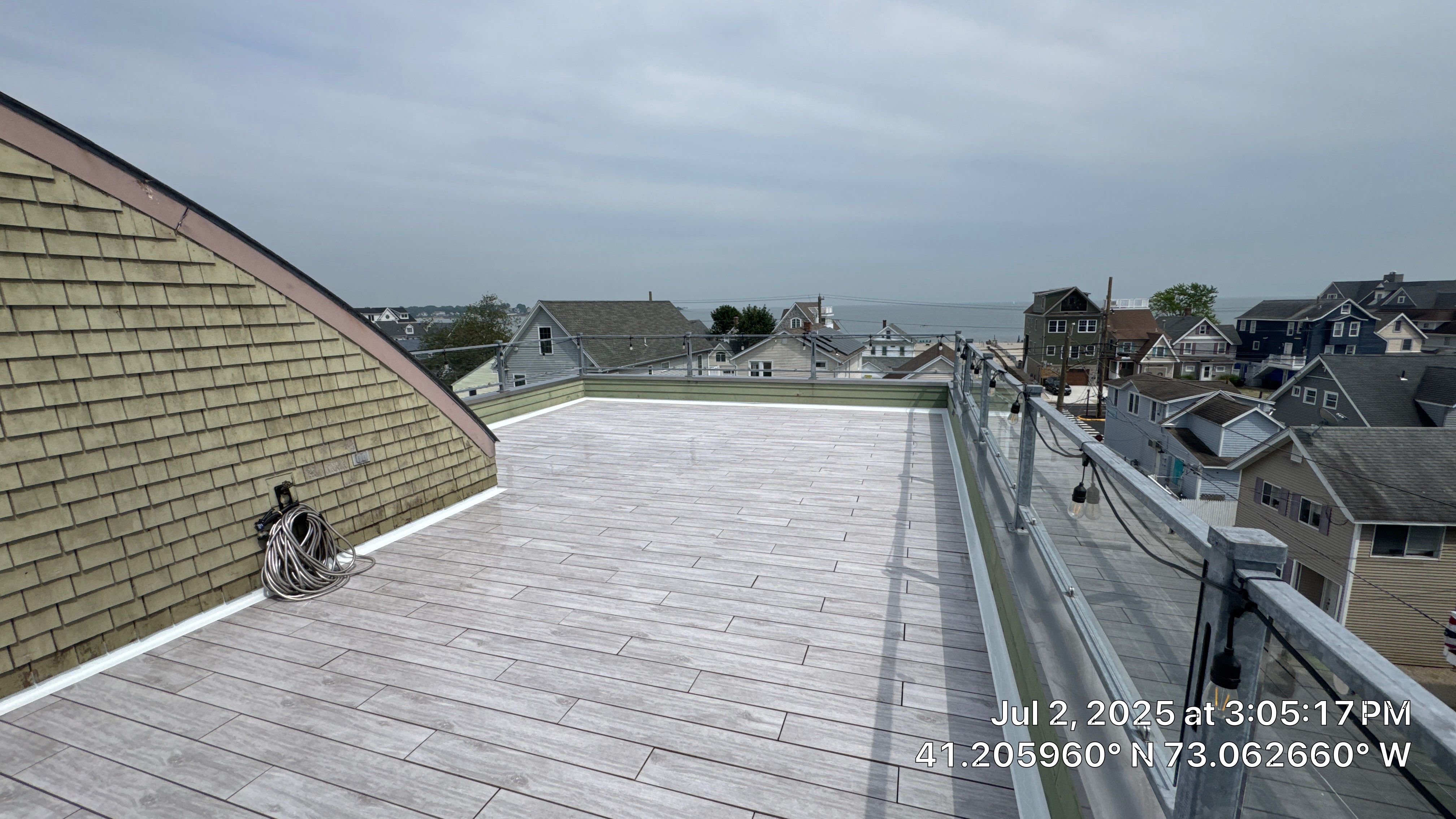 Deck Installation using Tanzite Stone Decking by A Plus Exterior