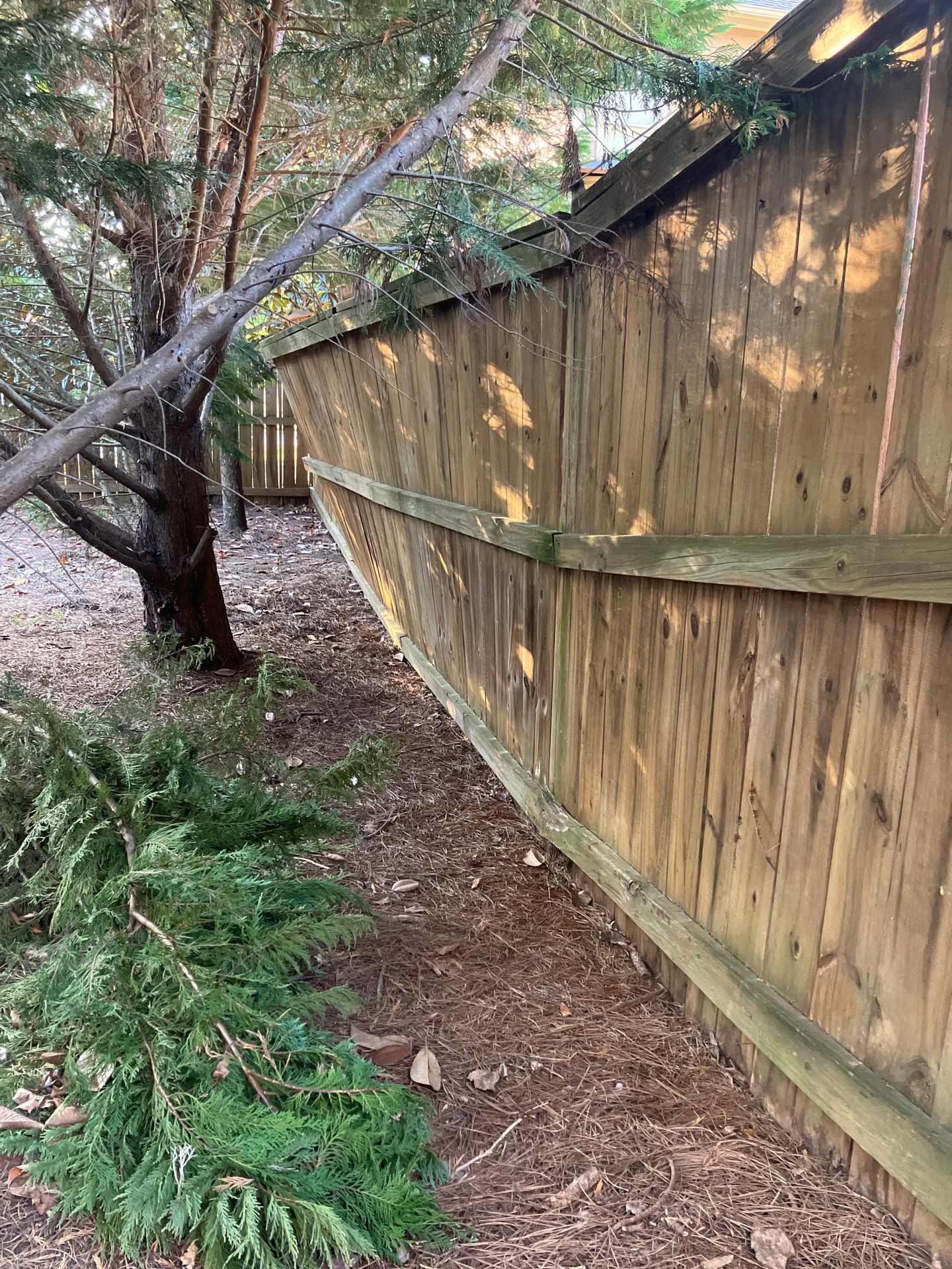 Fence Installation of Capped Wood Privacy Fence using 6X6 posts and copper post caps.  by Titans of Timber Fence & Stain