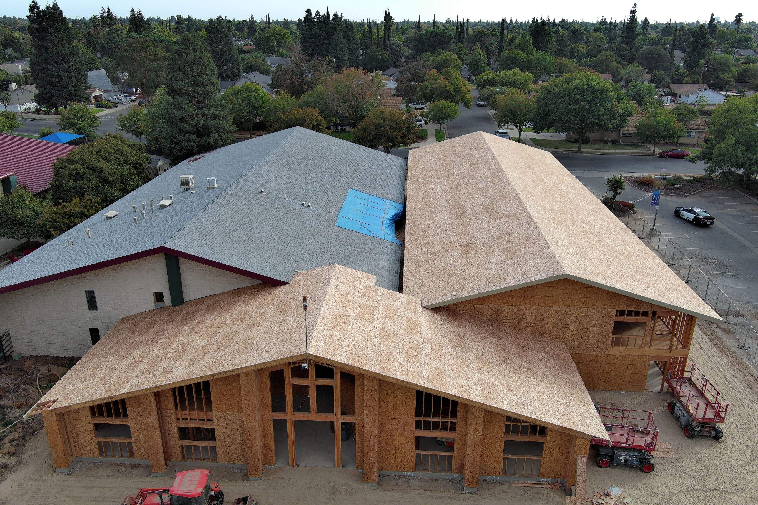 Metal roofing installation on church by Straight Edge Roofing Inc