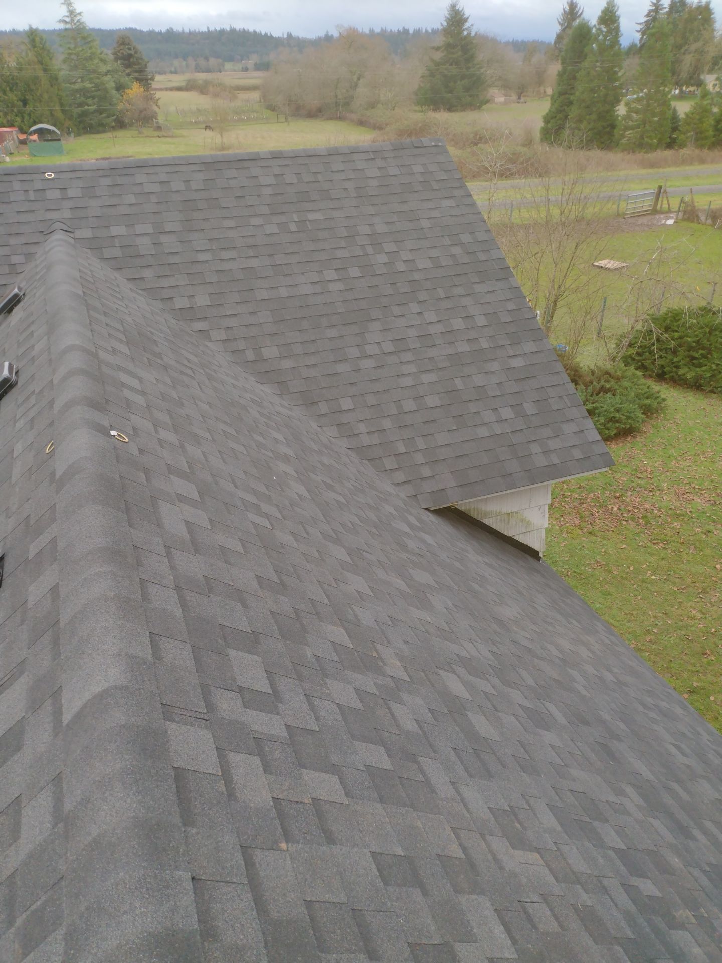 Residential Roofing Installation using IKO Dynasty (Color: Granite Black) by Orezona Building & Roofing Company, Inc.