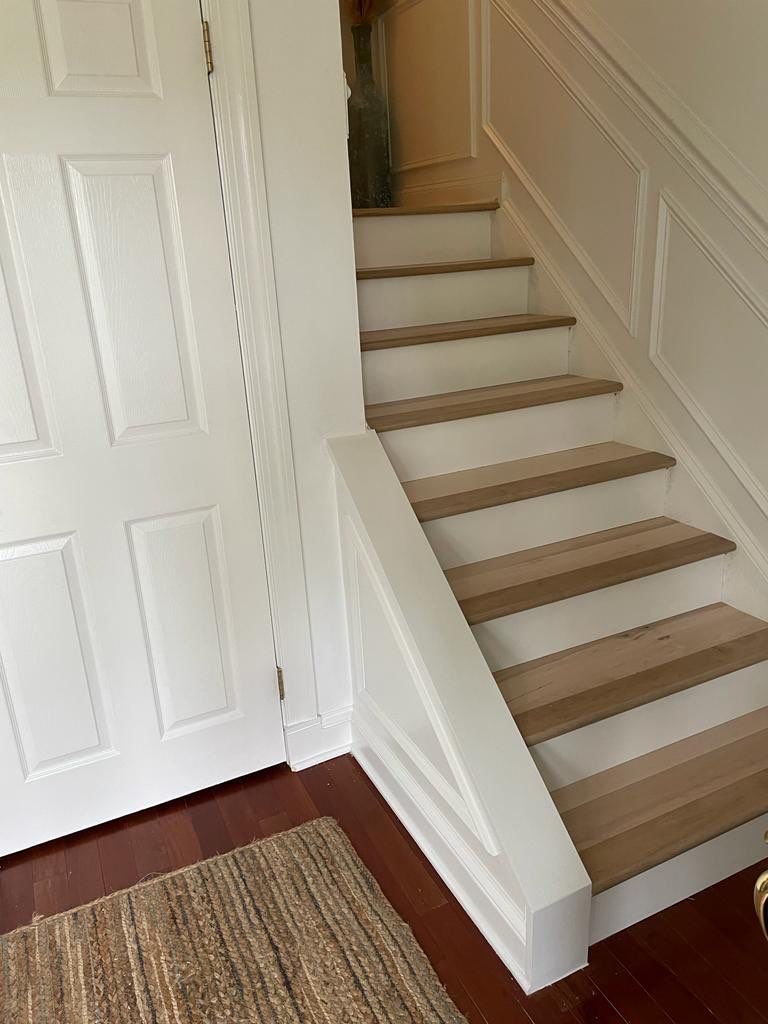 Flooring Installation using Maple Hardwood by Greenspring Construction Services