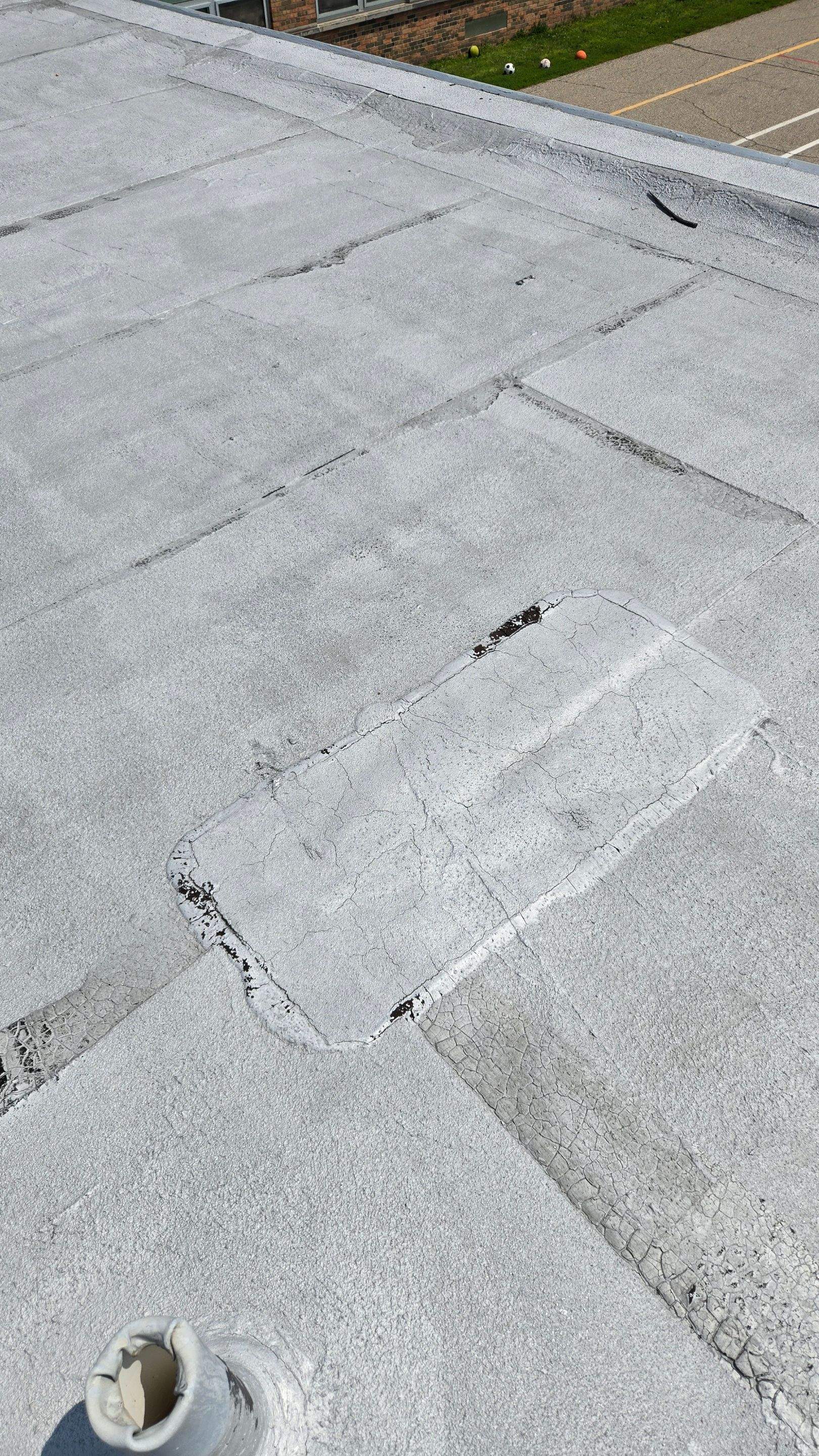 Just a pitch Pocket on a School by Level Up Roofing and Restoration Services LLC