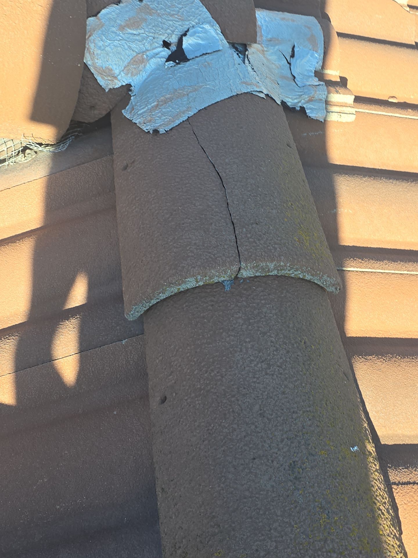 Tile Roof repair by Grandmark Service Company