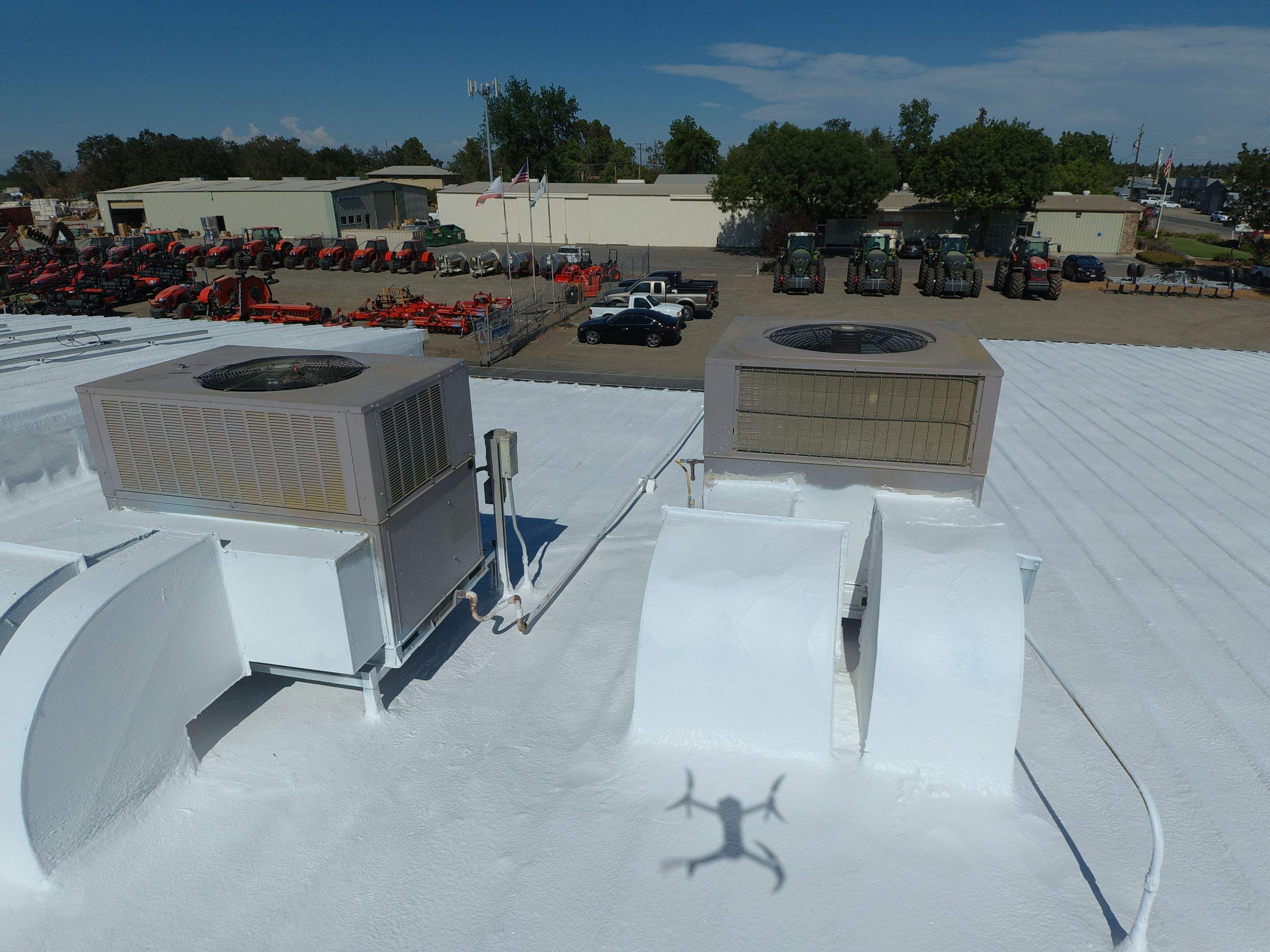Spray foam and coatings using Conklin Benchmark/PUMA XL coatings and spray foam by Straight Edge Roofing Inc
