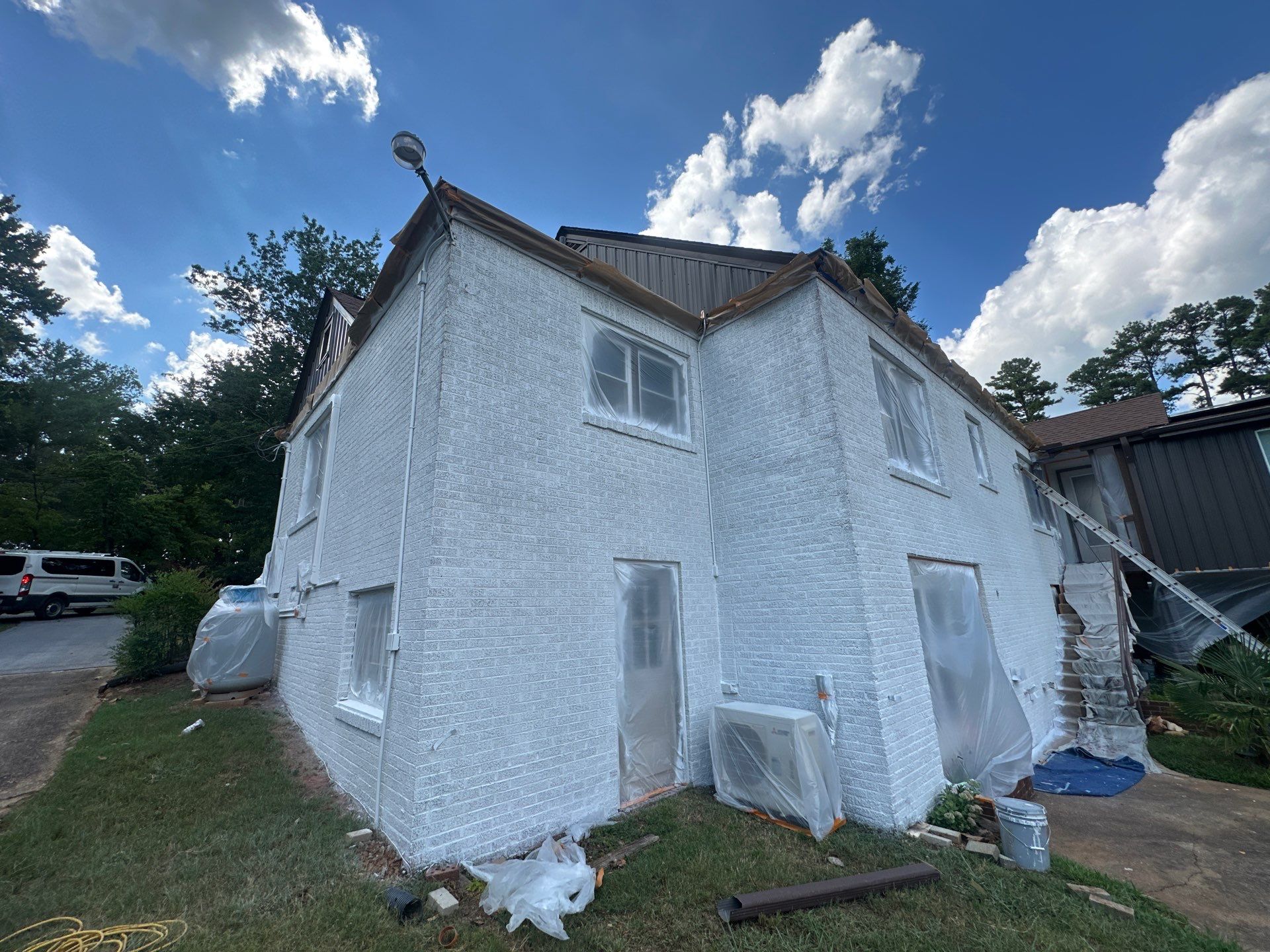 Comprehensive Home Renovation Featuring Shiplap Walls and Marble Bathrooms by Painter1