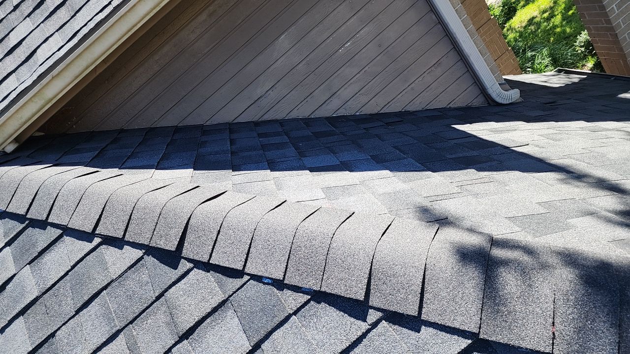 Residential Roofing Installation using Certainteed Landmark Moire Black by Galvan Roofing and Construction