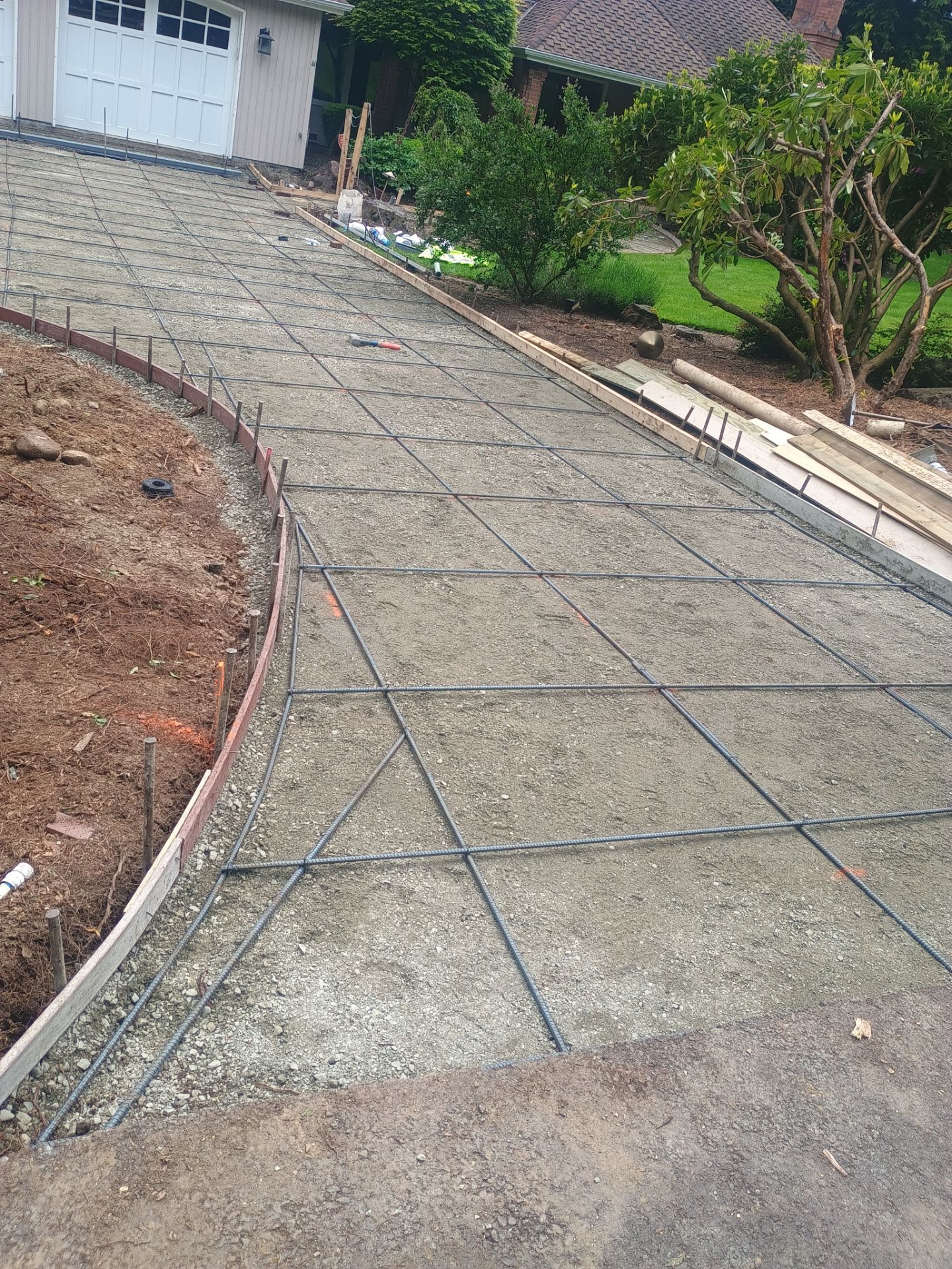 Stamped Concrete Driveway Renovation | Woodinville  by Jireh Asphalt & Concrete Inc 