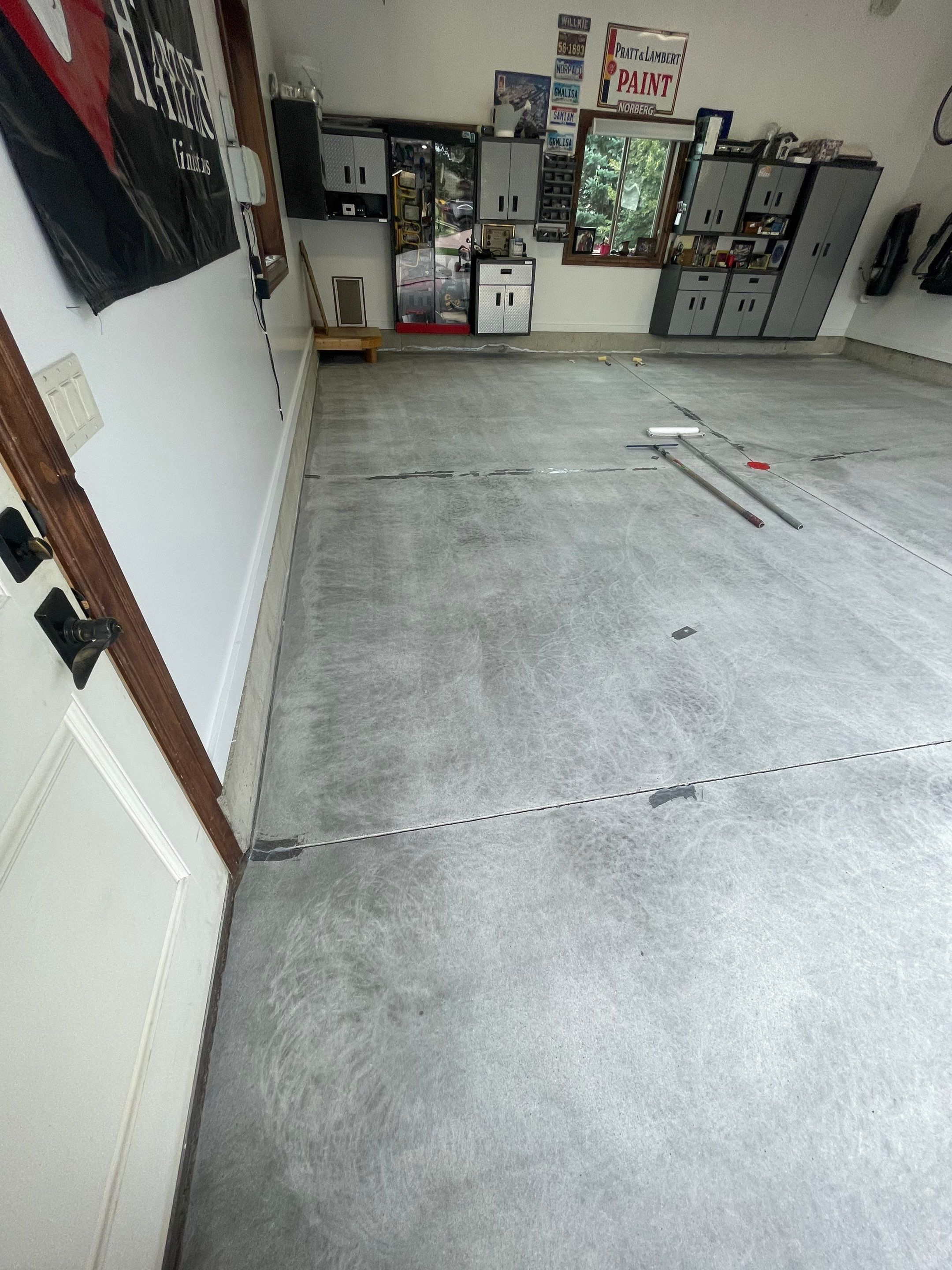 Garage Floor Coating and Domino Flake Finish in Sioux Falls by Select Painting, Coatings & Garage Cabinets
