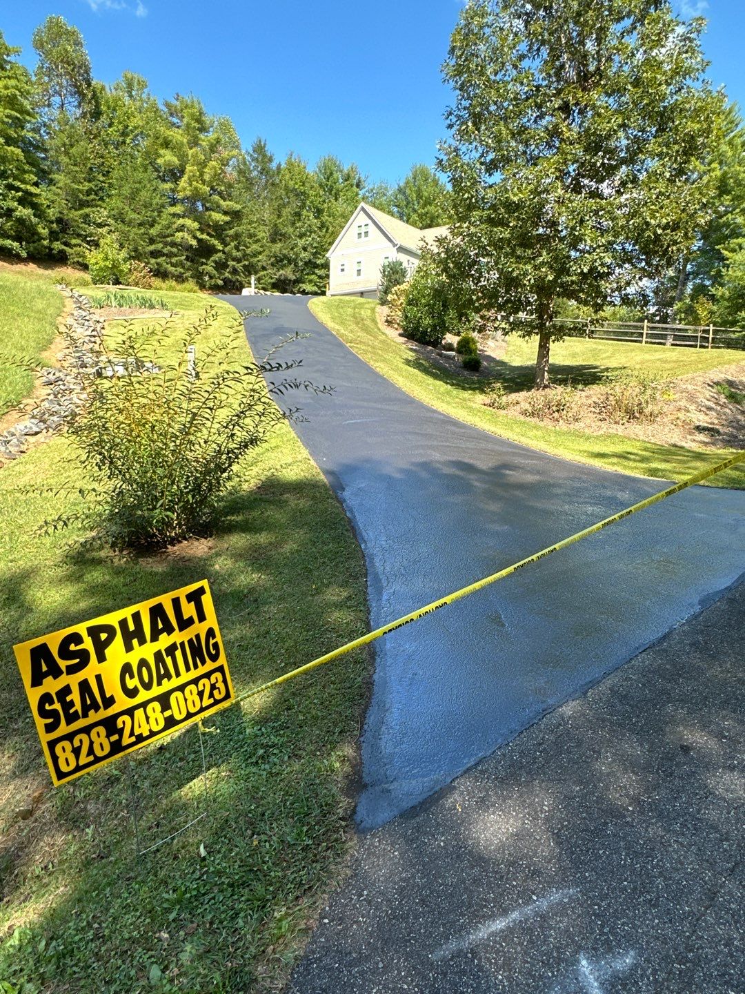 the service being done is asphalt seal coating for driveway protection and enhancement