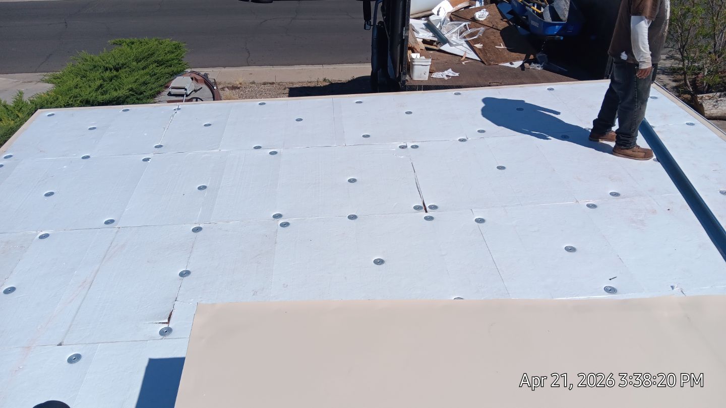 Residential TPO Roof Replacement and skylight replacement in Albuquerque by Doyle Roof Masters Inc