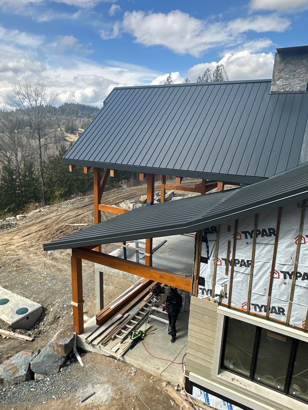 Residential Roofing Installation using 12" Prolok metal by Top Notch Roofing Inc