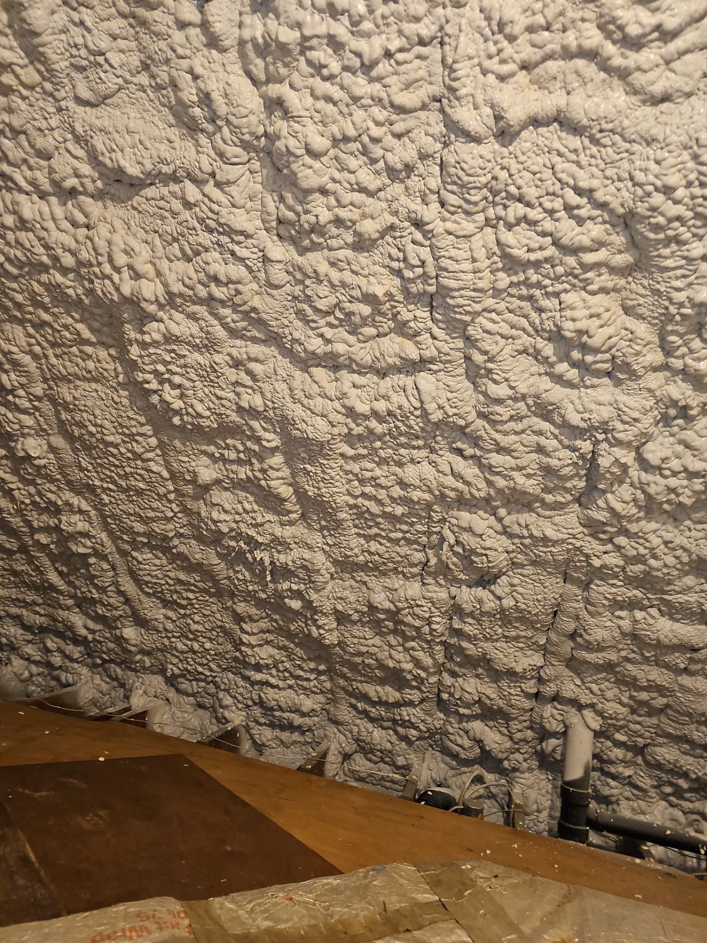 Attic Retrofit using open cell spray foam by NYS Foam & Energy