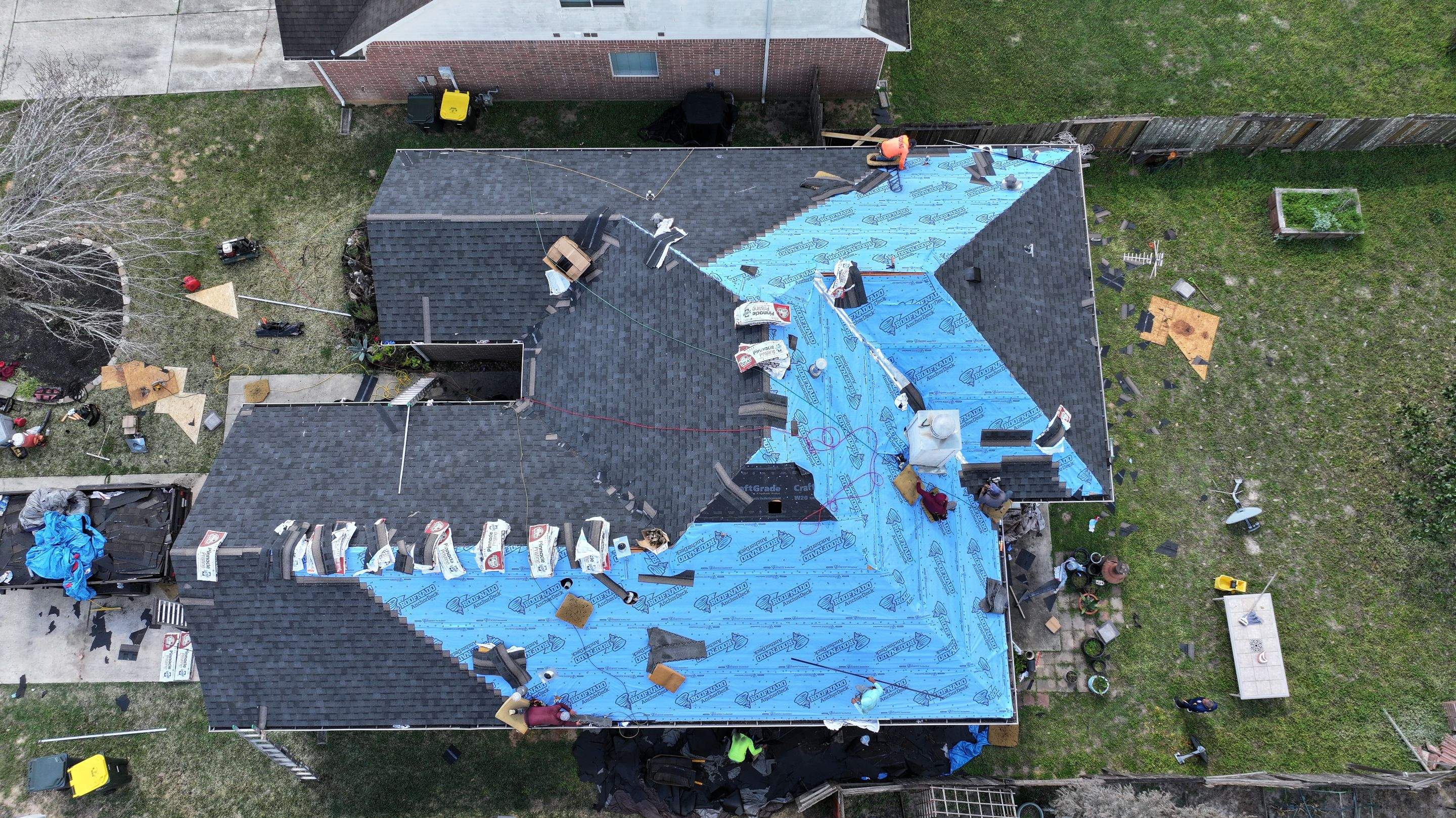 Full Roof Replacement on Brick Two-Story — Conroe, TX by PL Roofing & SB Roofing, LLC.