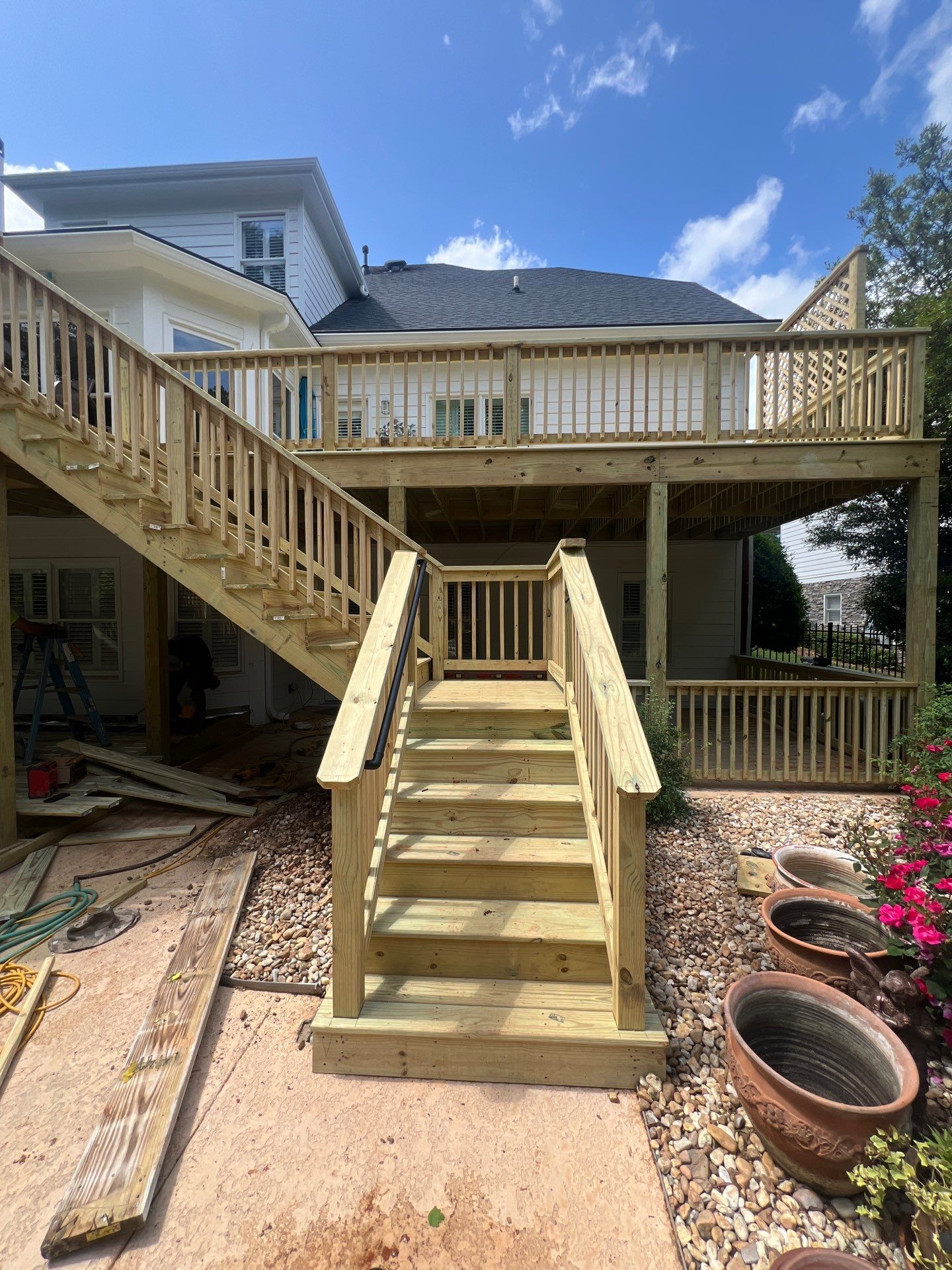 Multi-Level Pressure-Treated Wood Deck and Screened Porch in Acworth by Swift Home Renovations