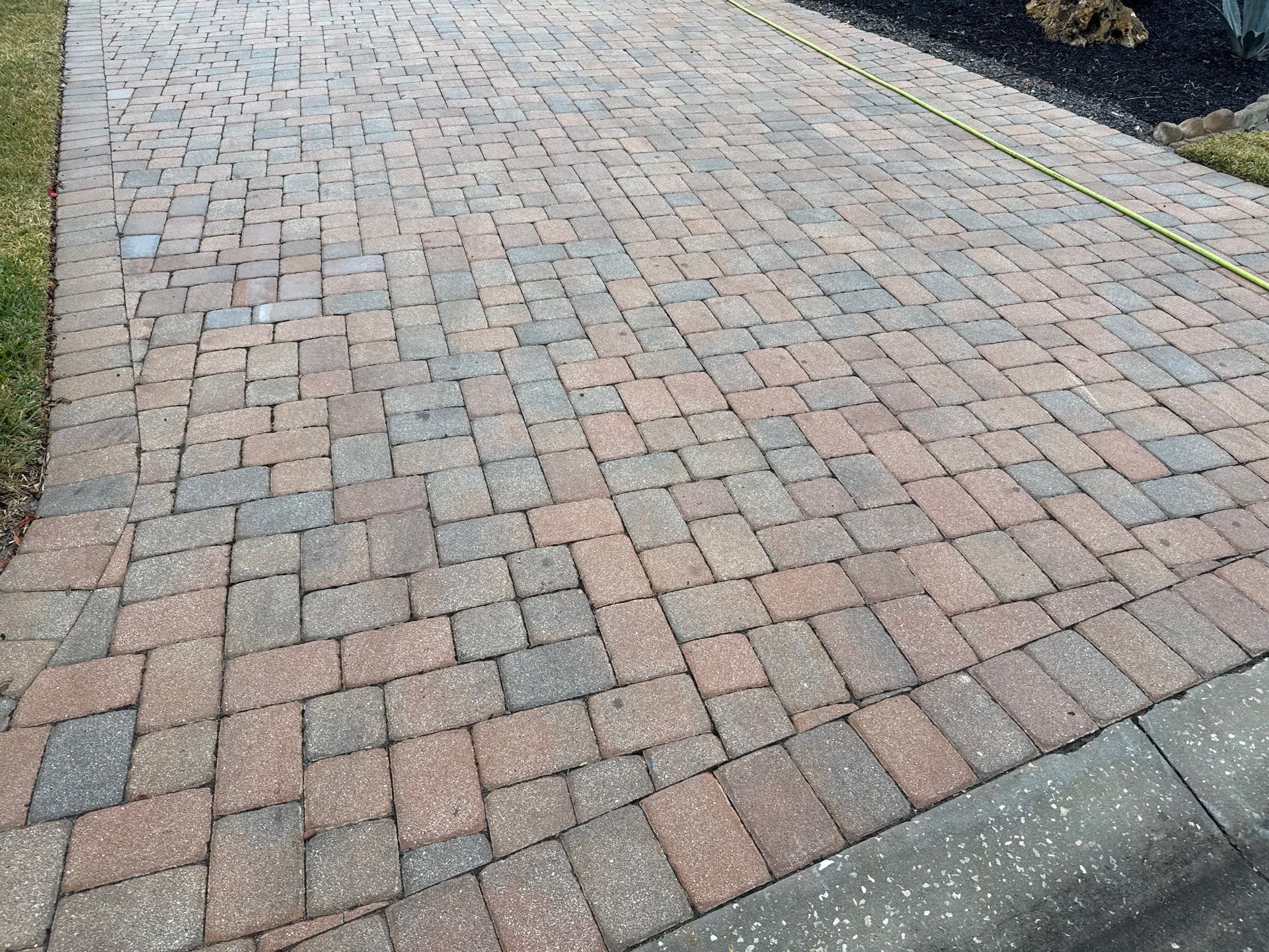 Oil & Tar Removal from Paver Driveway & Entryway by Sunshine AquaWash
