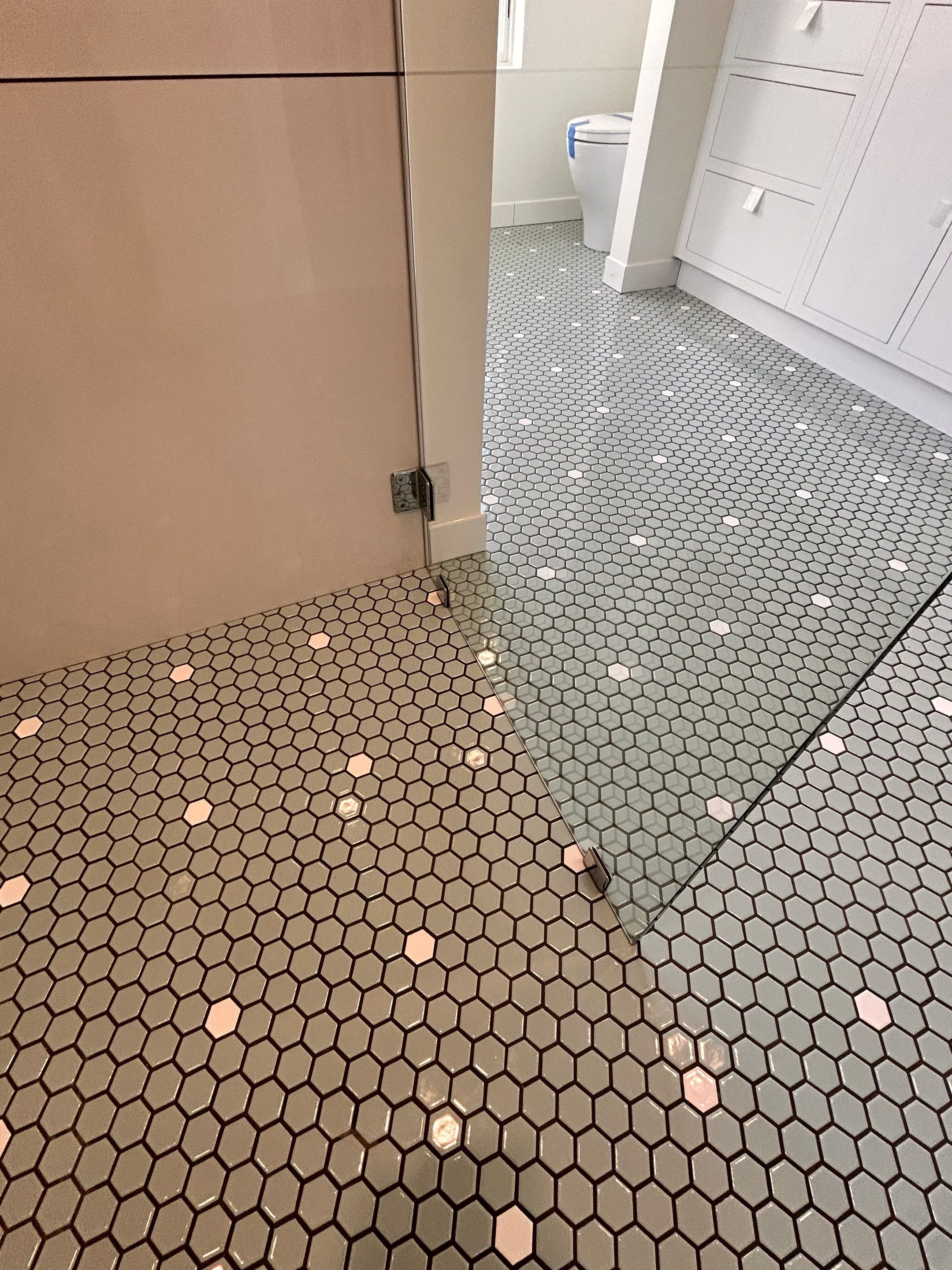 Frameless Spray Panel using Tempered Shower Glass by Cheshire Glass Company