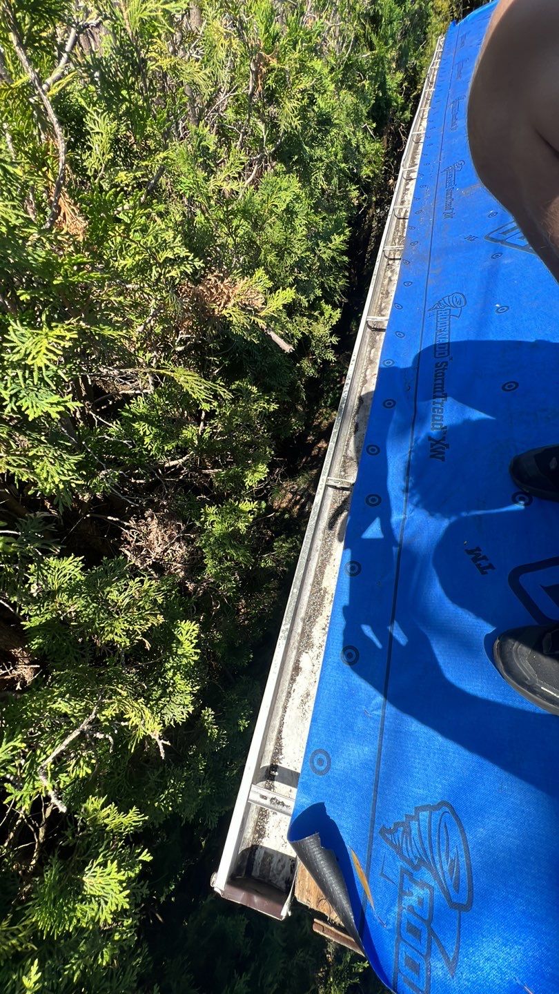 Residential ReRoofing Installation using Duraclad 26ga by Top Notch Roofing Inc