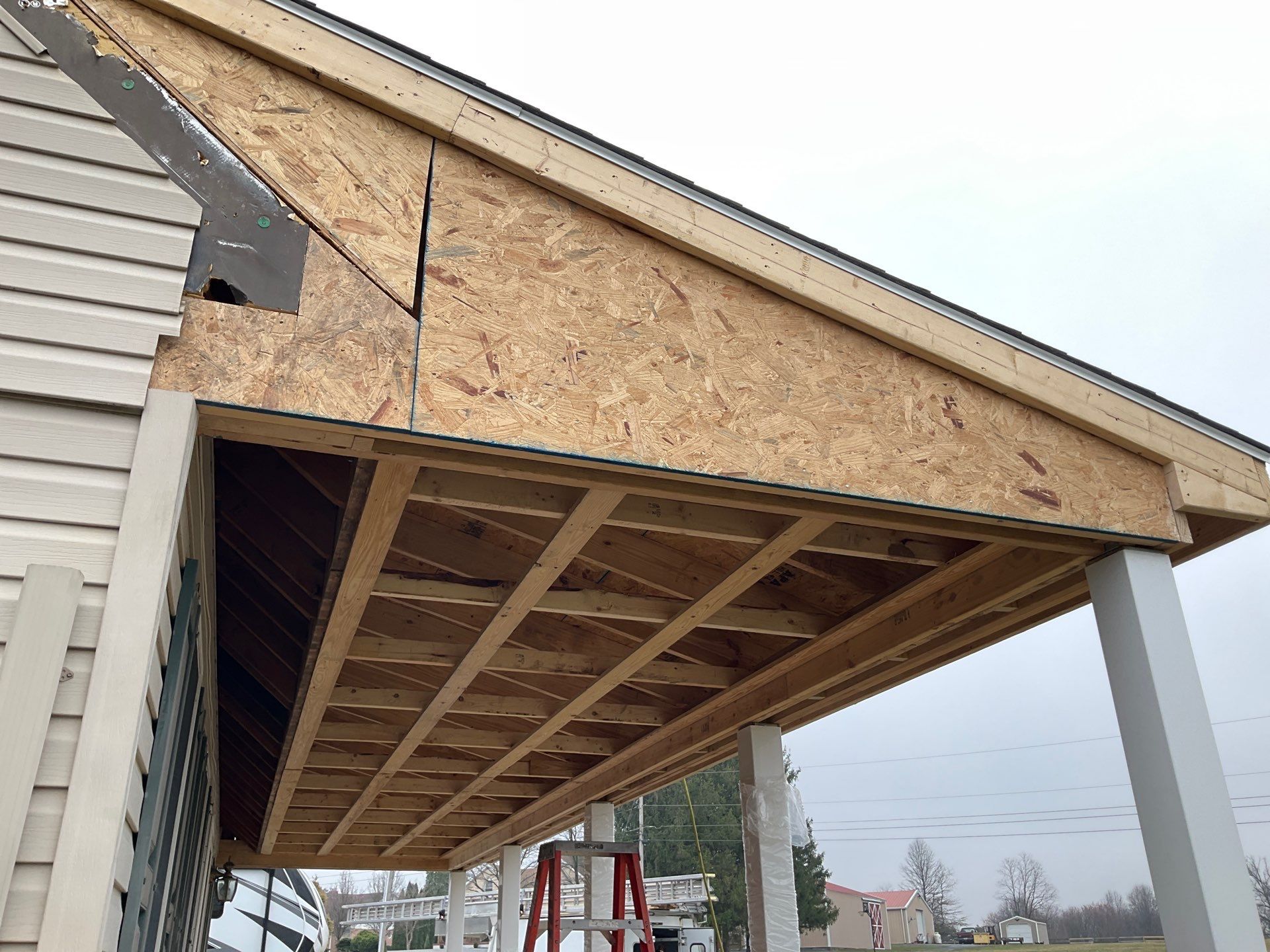 Custom Porch Roof Addition and Siding Renovation in Myerstown, PA by Esh Builders