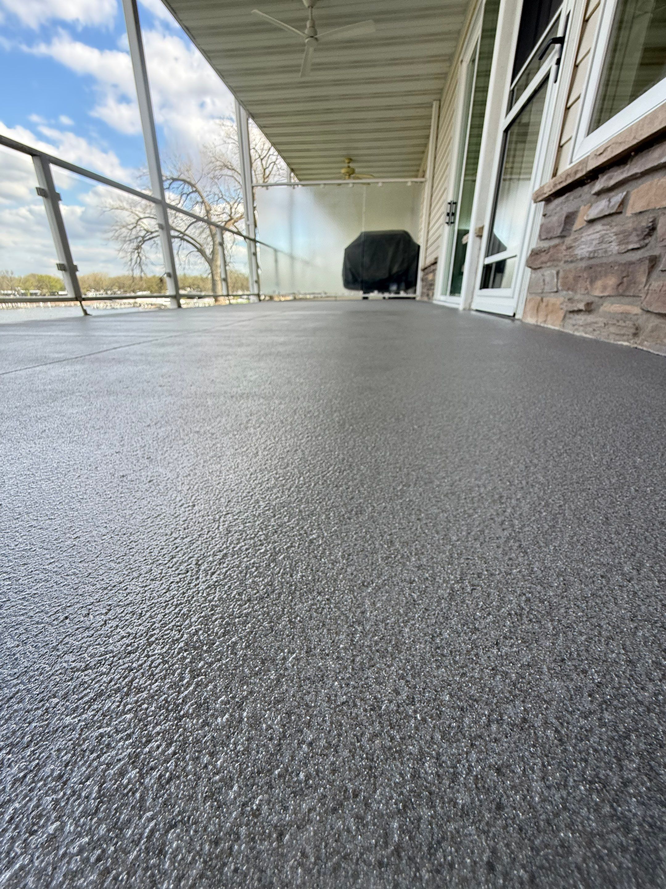 Dark Gray Slip-Resistant Concrete Coating for Arnolds Park Balcony by Select Painting, Coatings & Garage Cabinets