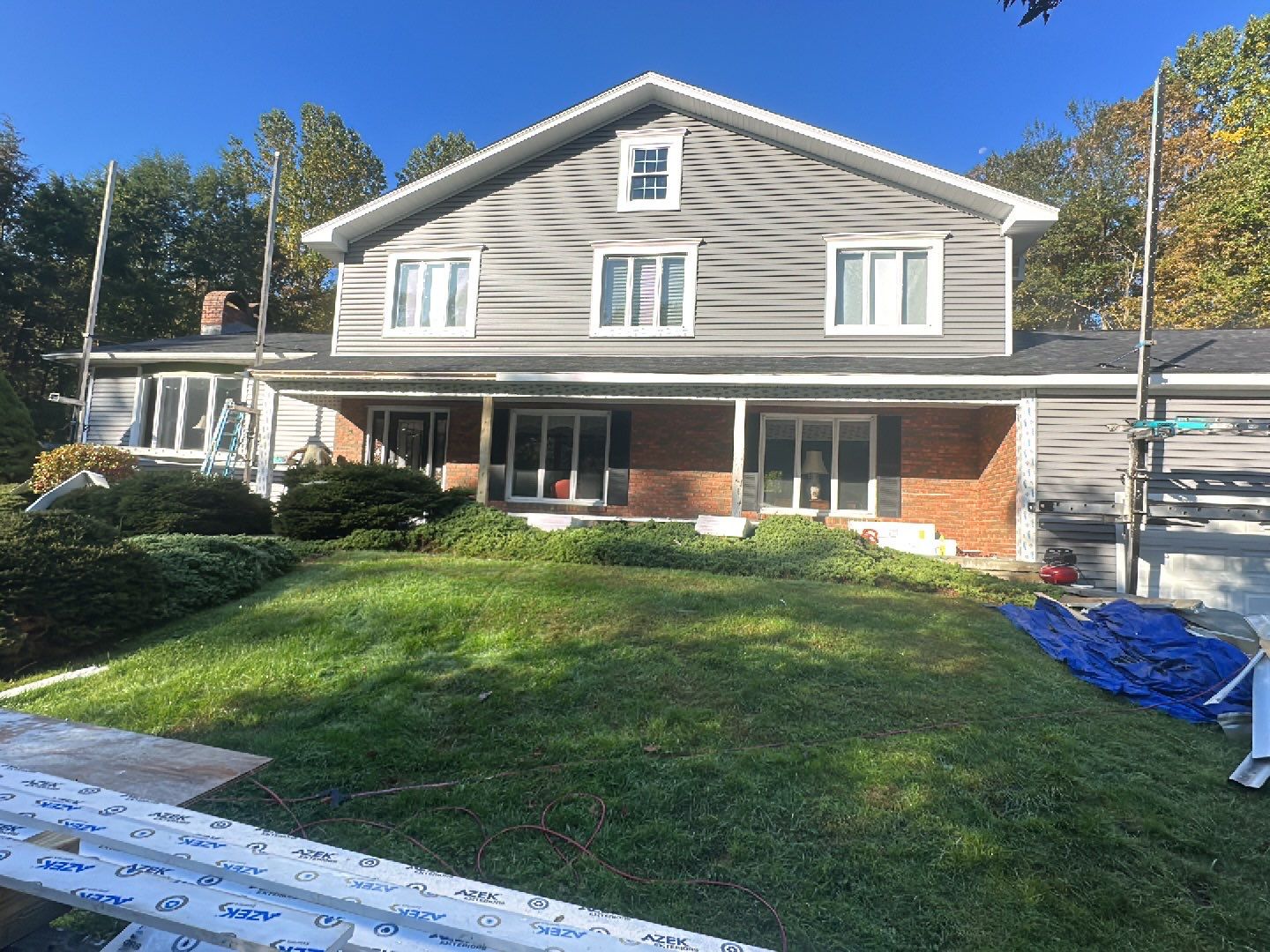Residential Roofing Installation using Owens Corning TruDefinition Duration AR - Onyx Black & New Siding Using Mainstreet Charcoal Gray by A Plus Exterior