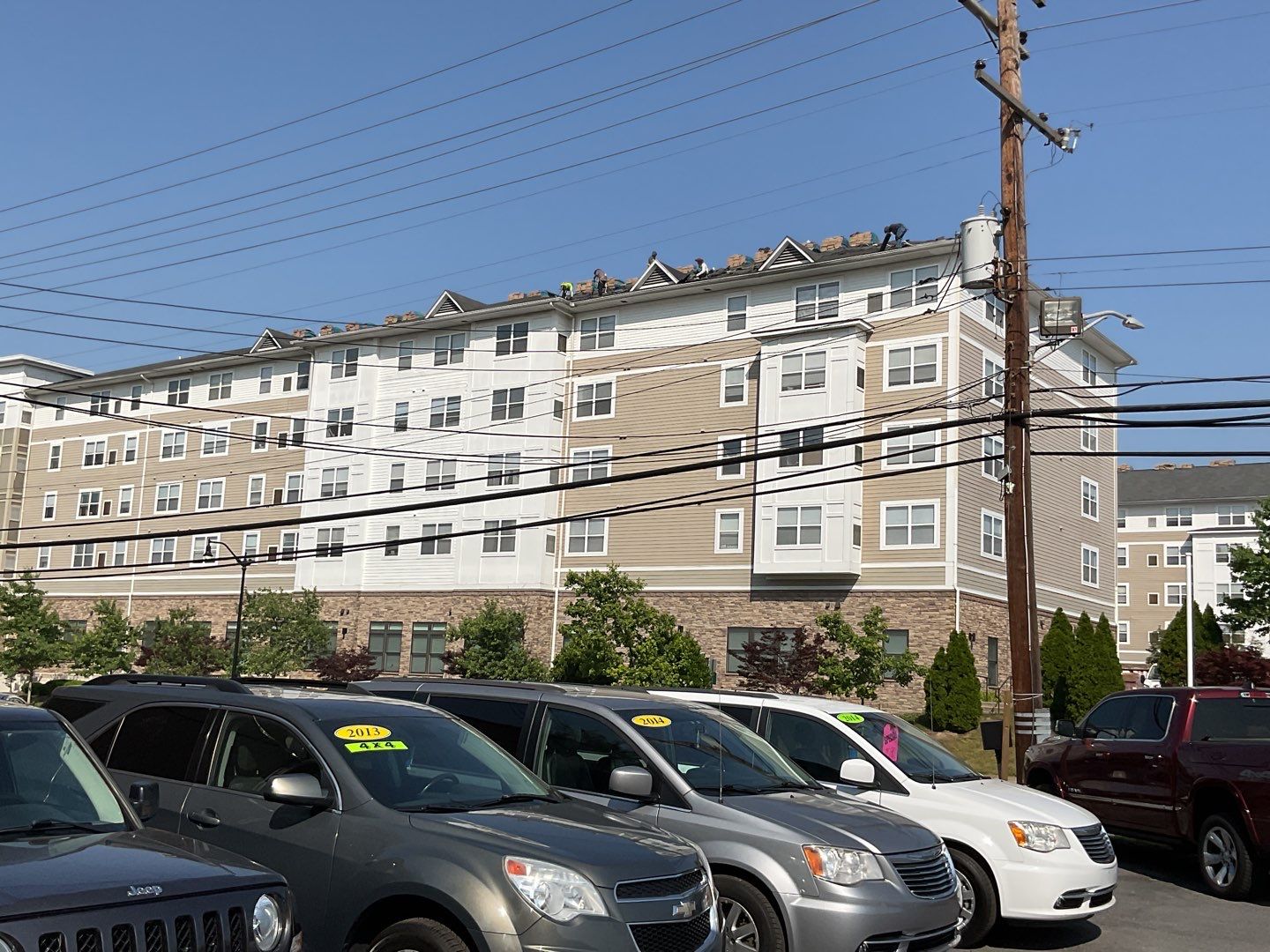 Multi-Family Commercial shingle roof by Alpha Design Services