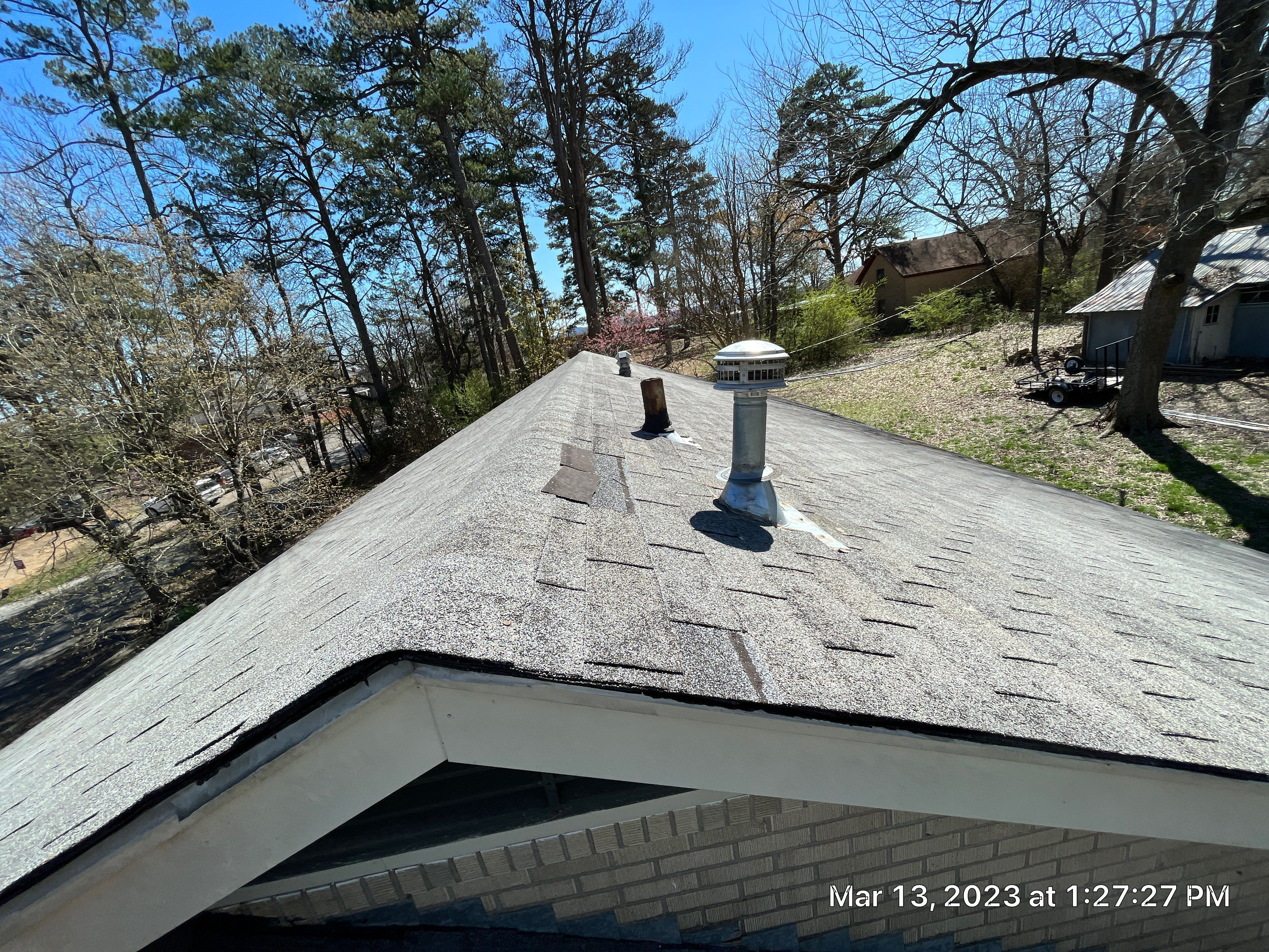 Residential Roofing Installation using 26 Gauge Colored Panels by Hostetler Roofing