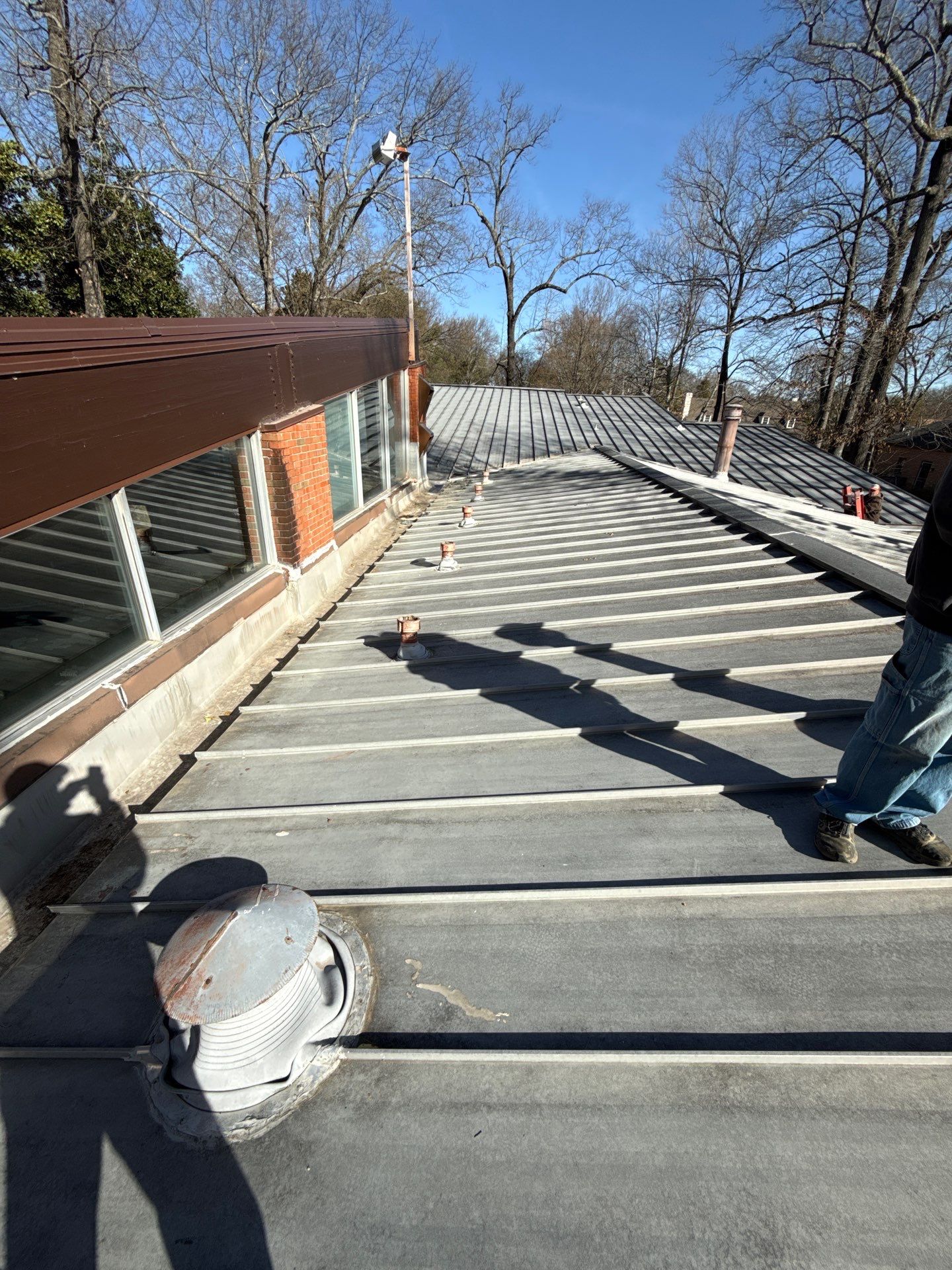 Residential Standing Seam Metal Roof and Membrane Replacement in Memphis by Revival Roofing Services